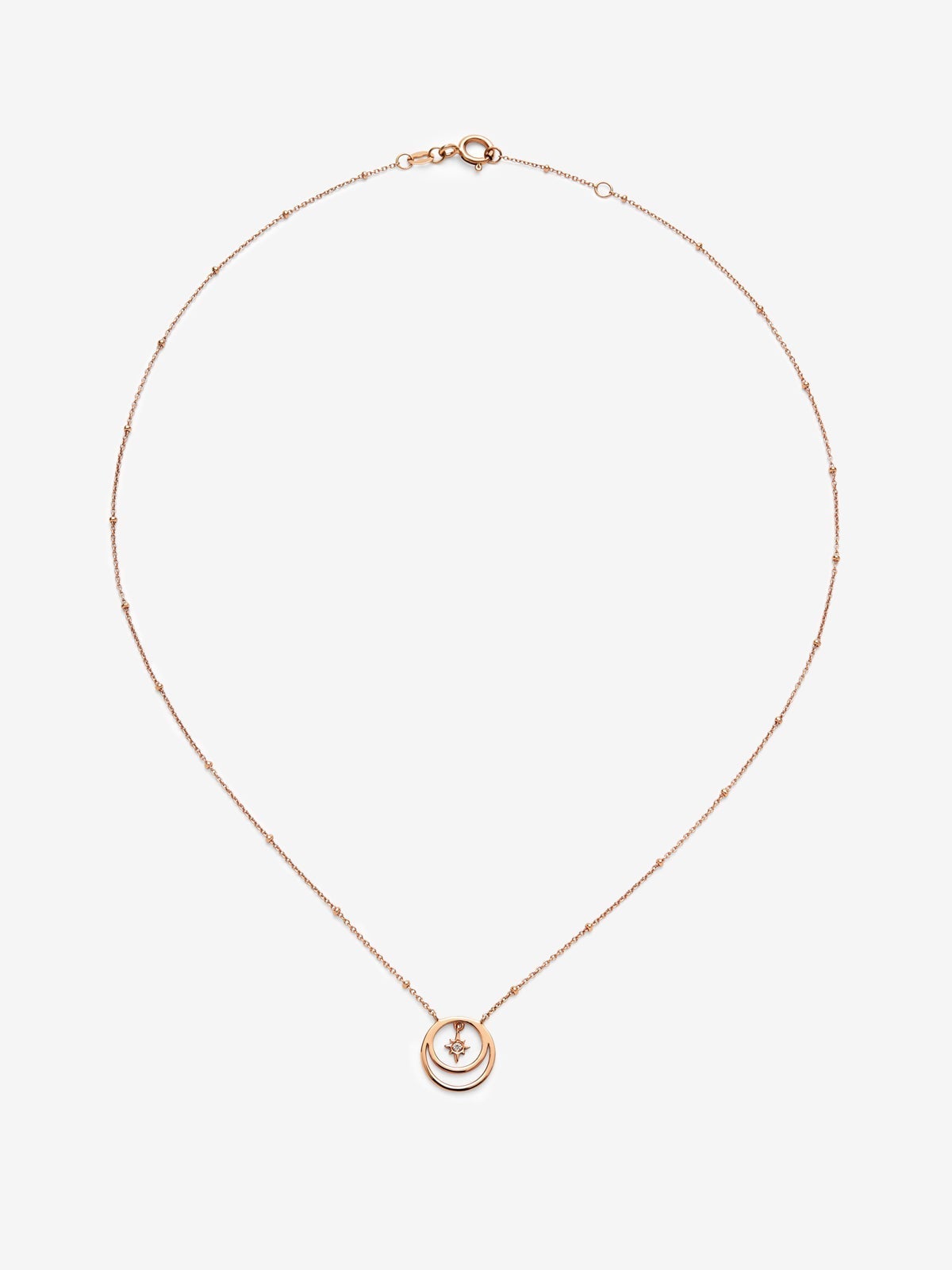 Colgante de oro rosa de 18K con diamante en talla brillante con un total de 0,01 cts