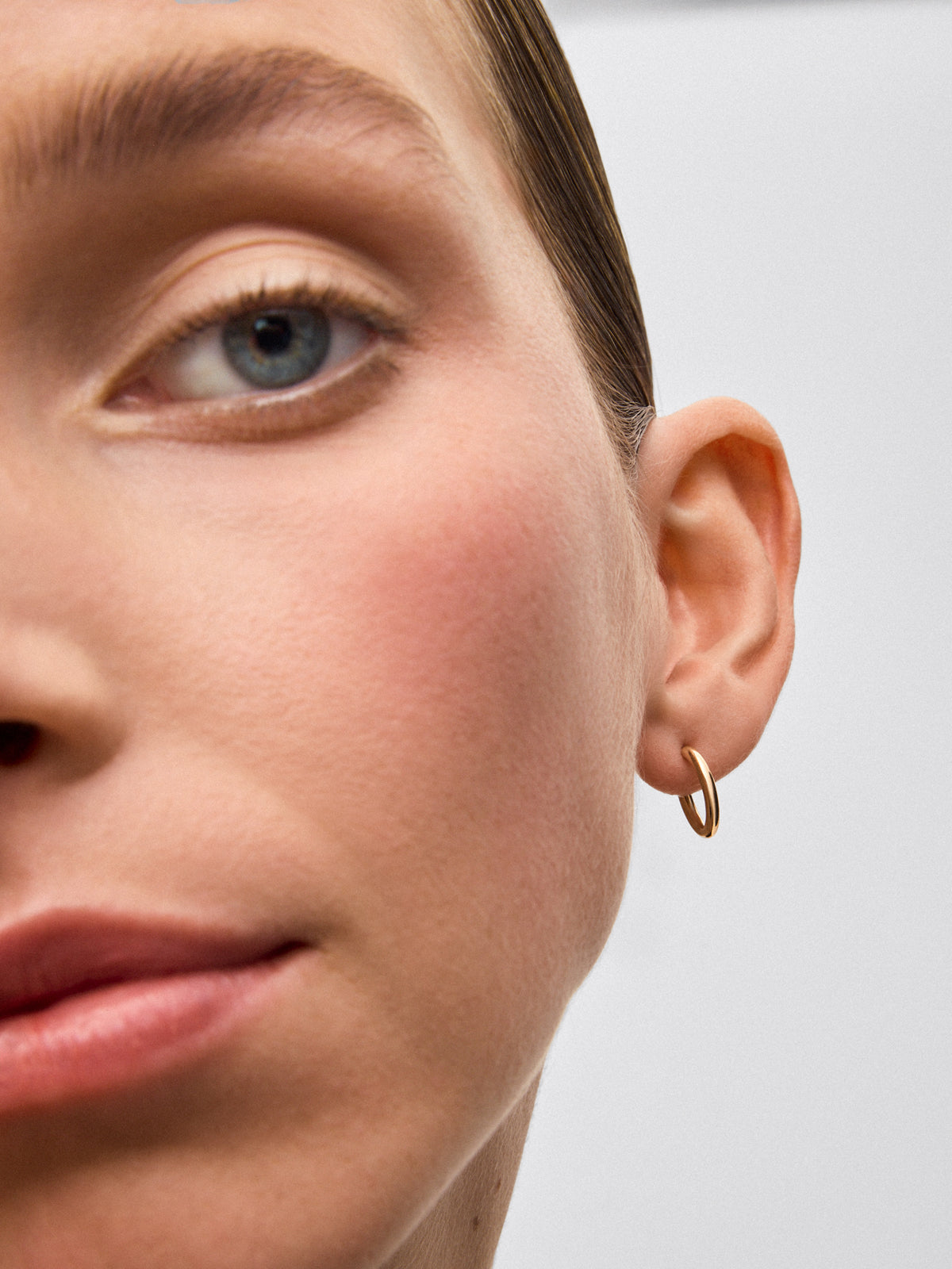 Pendientes de aro de oro amarillo de 18K de 11 mm