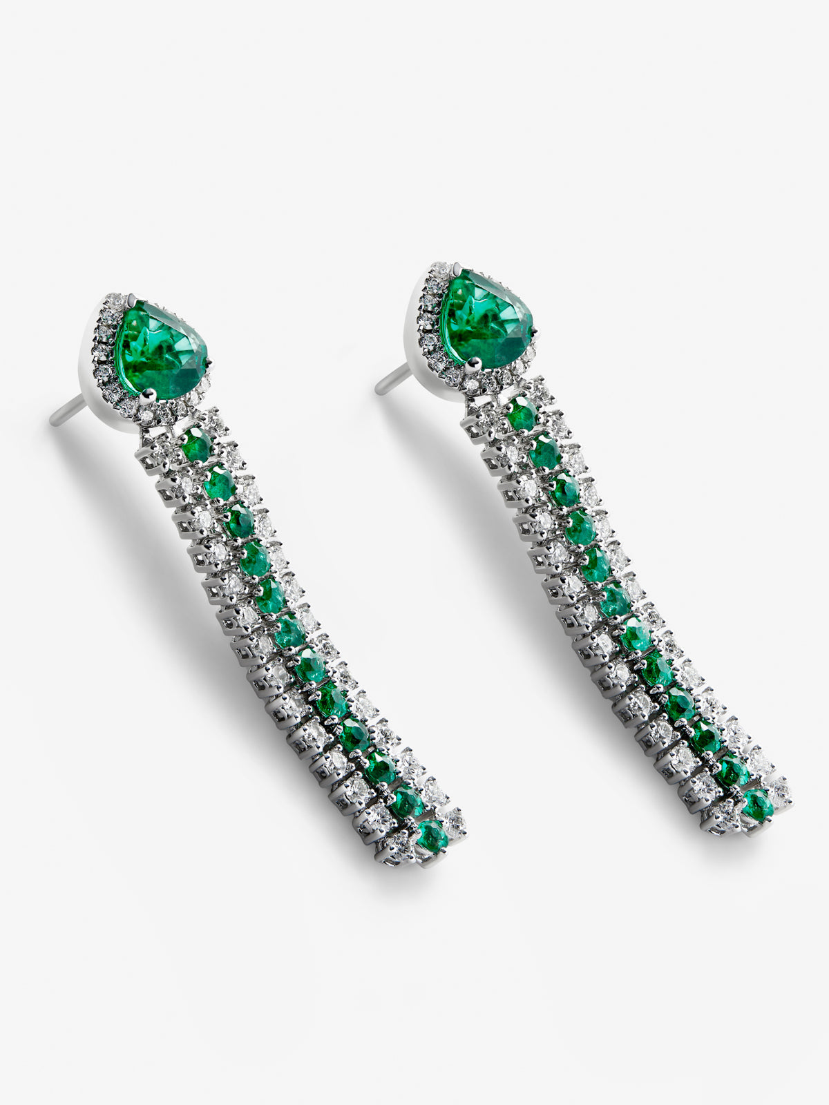 18K white gold hoop earrings with 2 pear-cut emeralds with a total of 1.68 cts, 24 brilliant-cut emeralds with a total of 0.76 cts and 92 brilliant-cut diamonds with a total of 1.13 cts