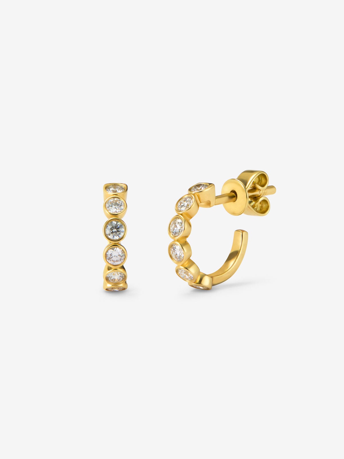 Pendientes de aro en oro amarillo de 18K con 14 diamantes en talla brillante con un total de 0,2 cts