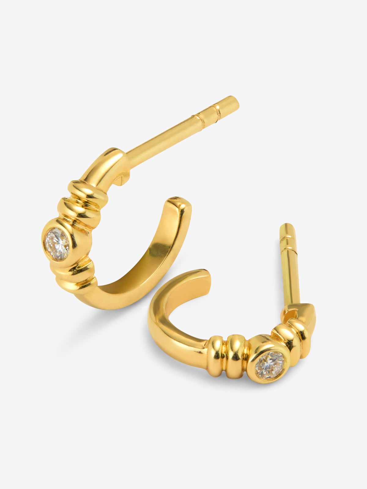 Pendientes de aro en oro amarillo de 18K con diamantes en talla brillante con un total de 0,07 cts