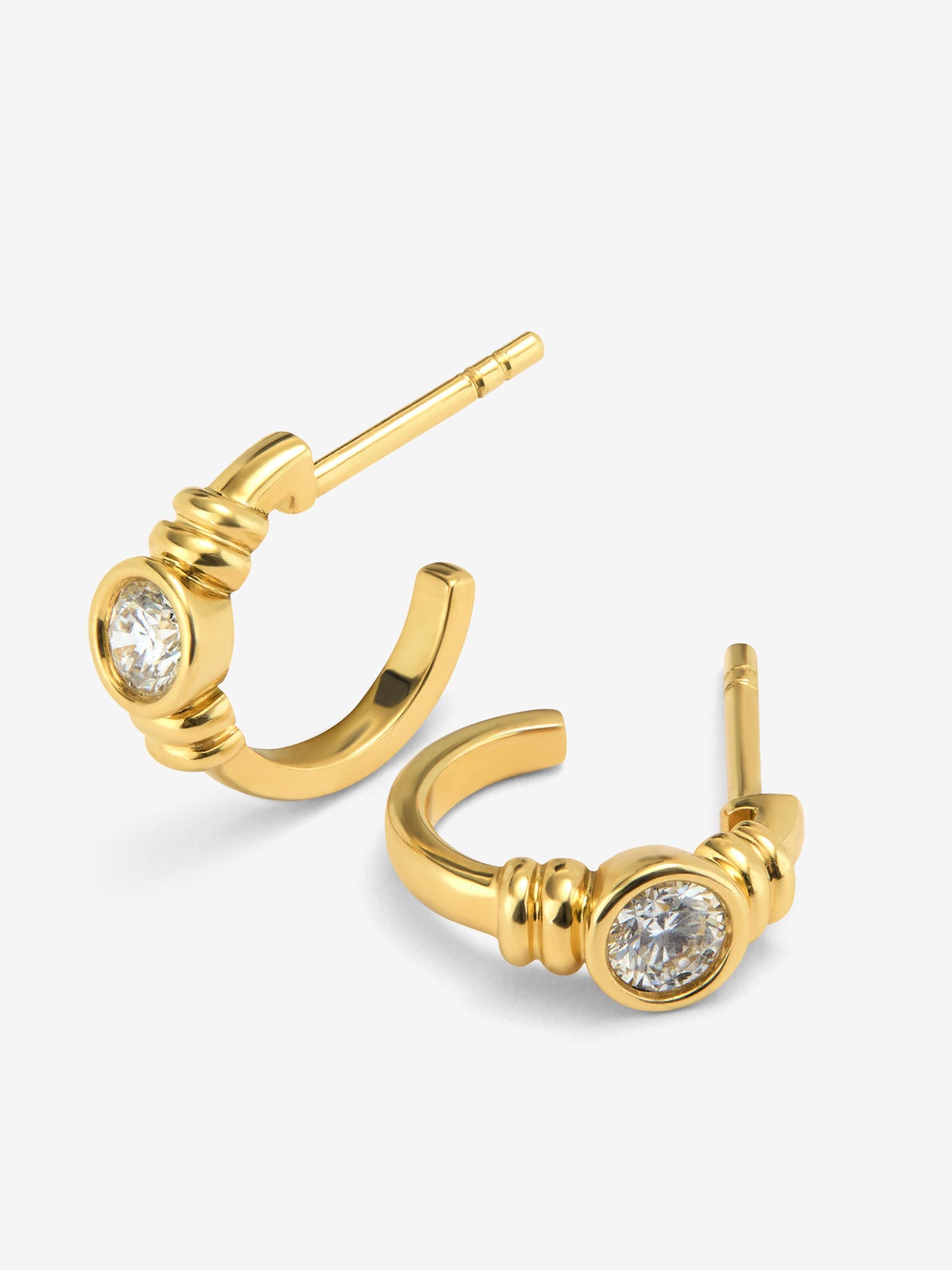 Pendientes de aro en oro amarillo de 18K con diamantes en talla brillante con un total de 0,34 cts