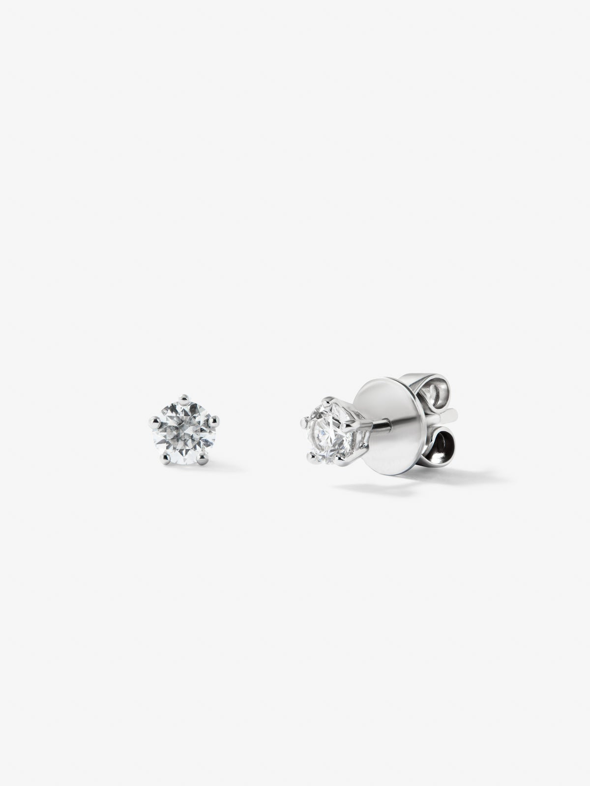 Pendientes de oro blanco de 18K con diamante solitario de 0,25cts