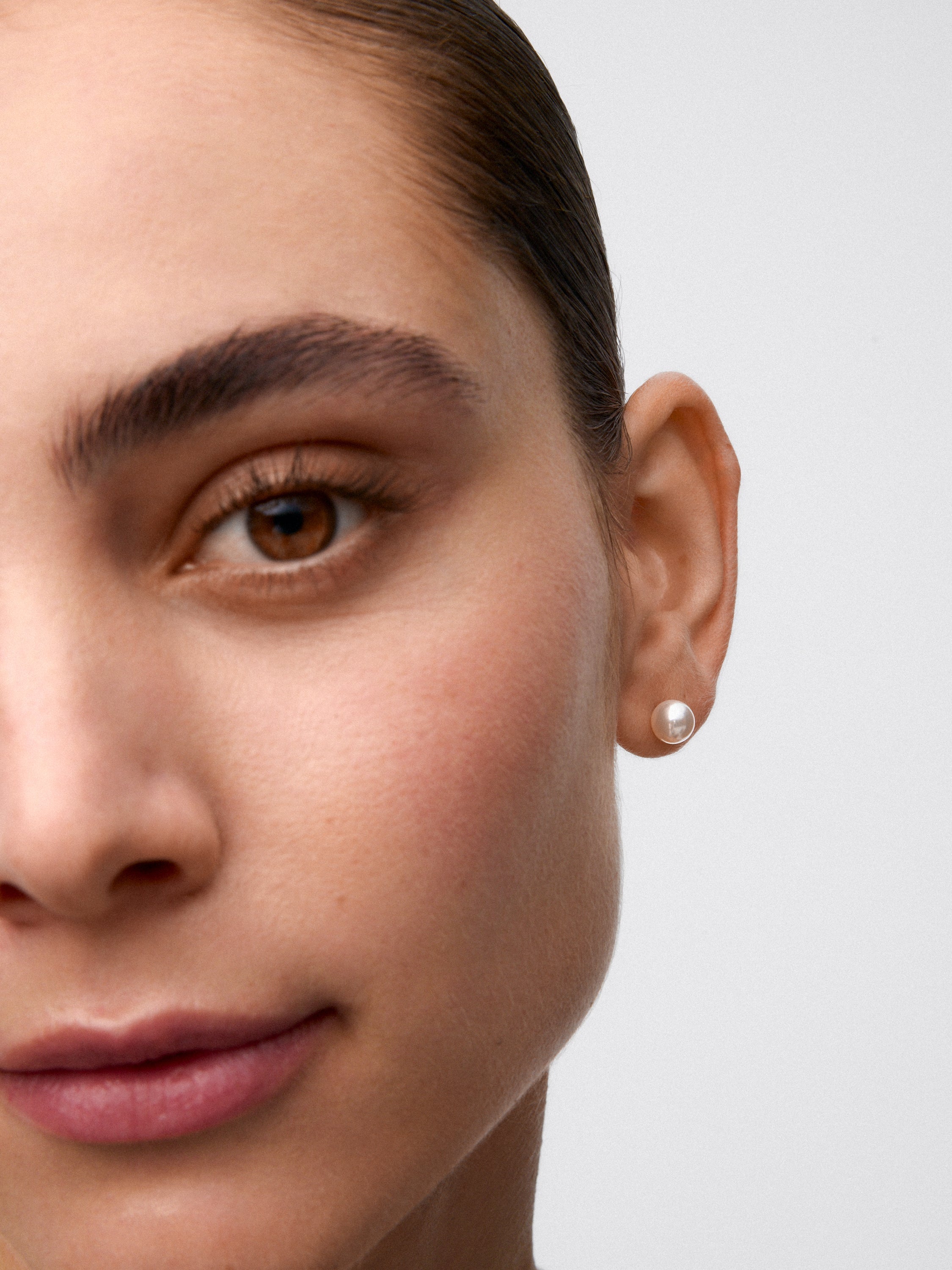 Pendientes de oro amarillo de 18K con 2 perlas de 7mm