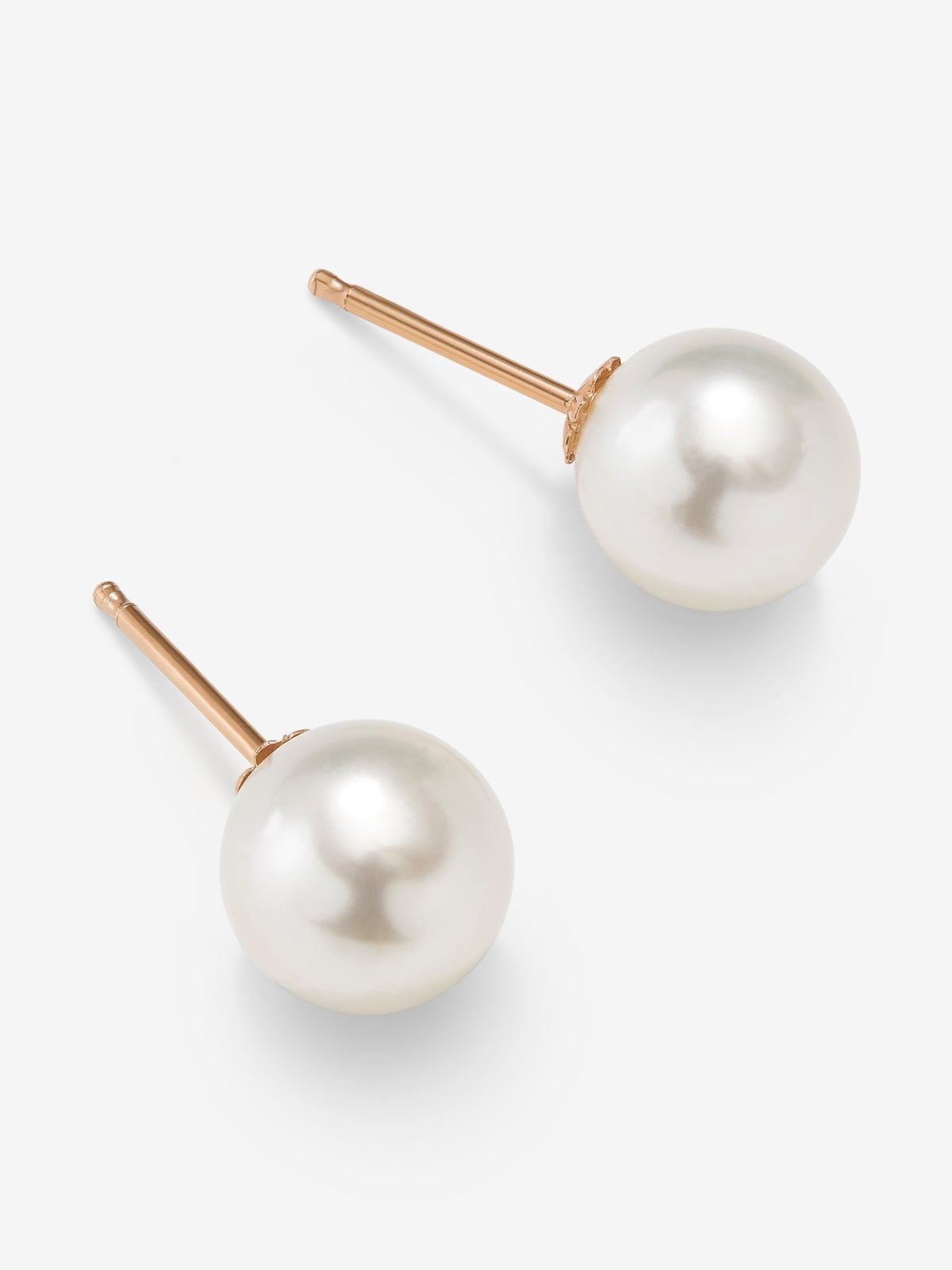 Pendiente de botón de oro rosa de 18k con perla australiana de 10 mm