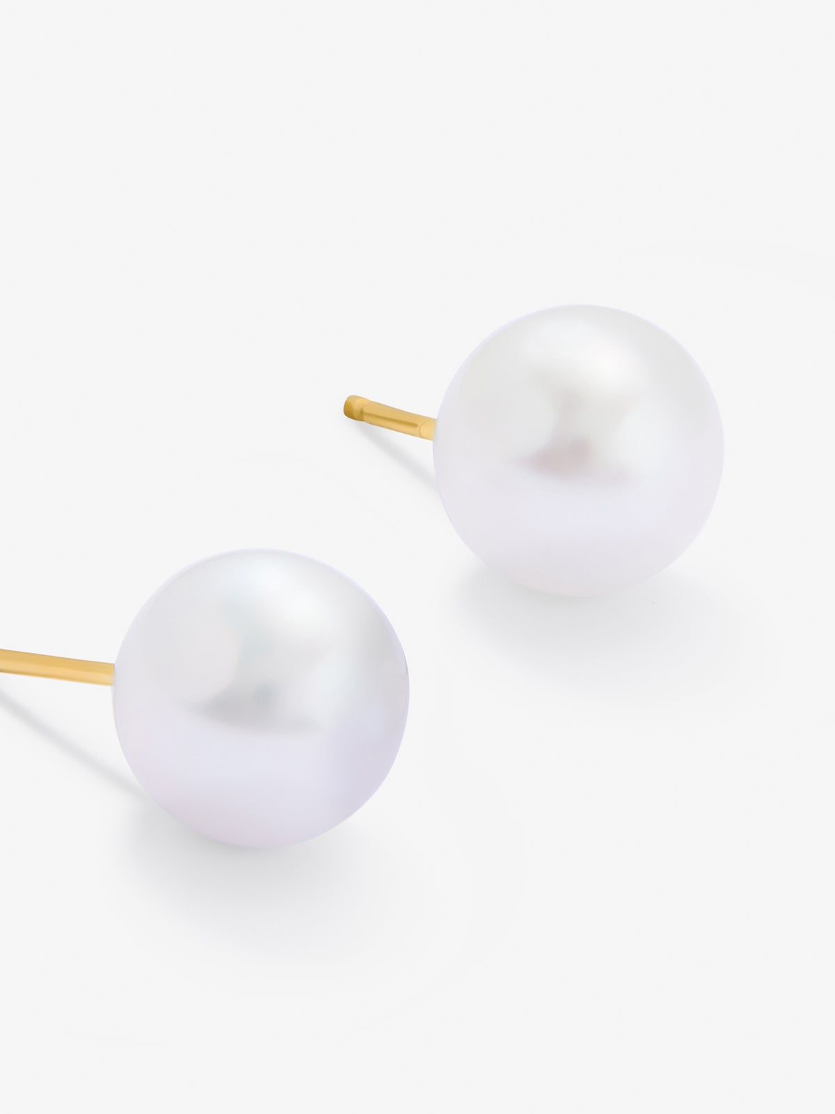 Pendiente de boton de oro rosa de 18k con perla australiana de 11 mm