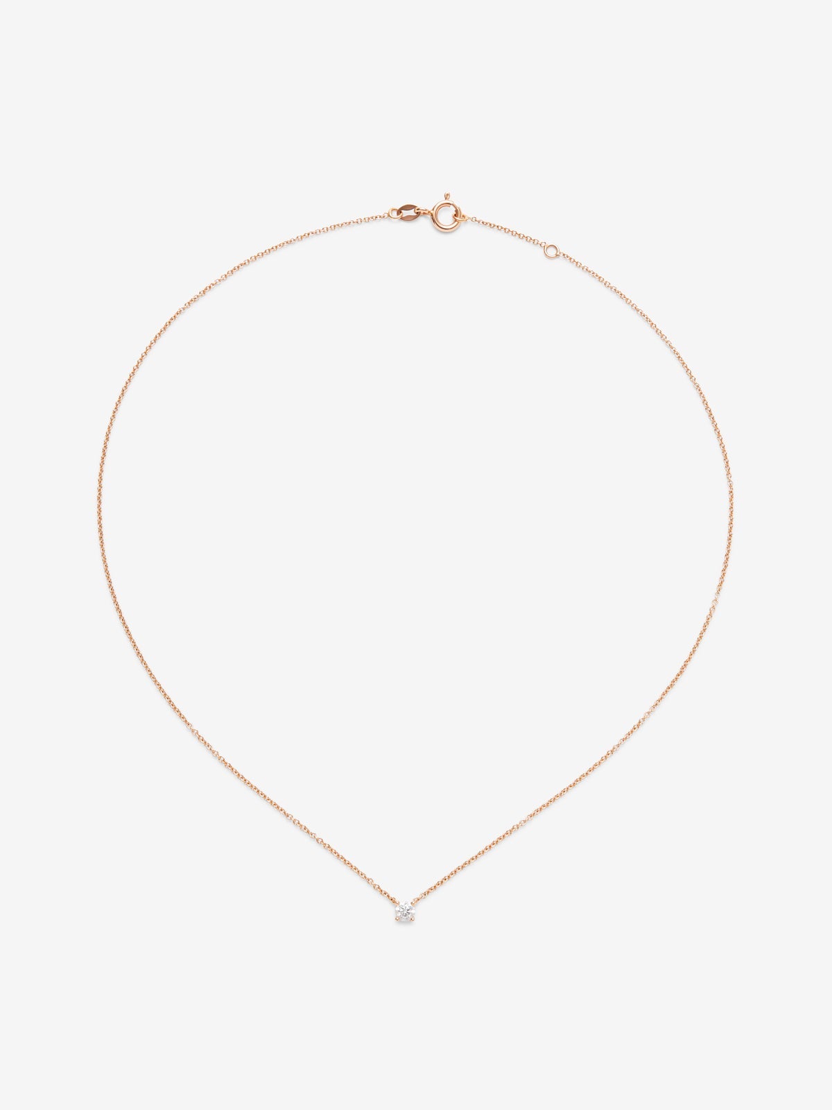 Colgante de oro rosa de 18K con diamante en talla brillante de 0,2 cts