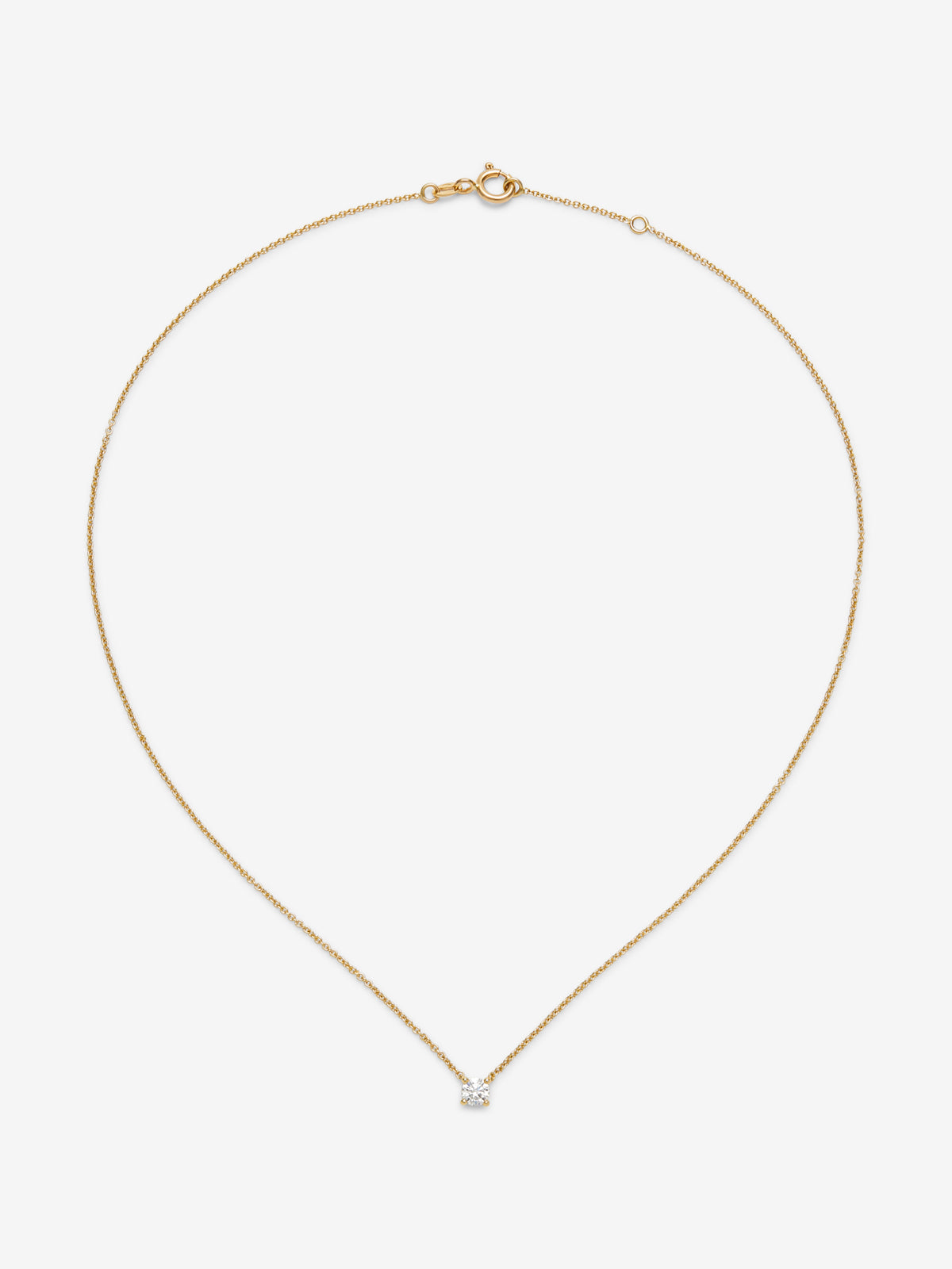 18K yellow gold necklace with a 0.30 ct brilliant-cut central diamond.