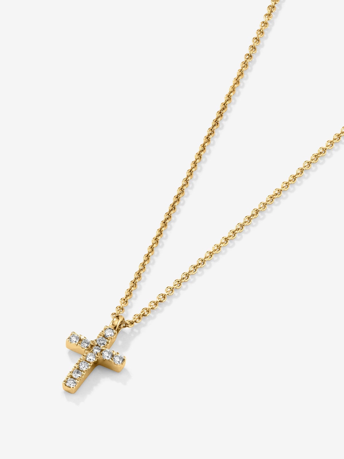 Colgante cadena cruz en oro amarillo de 18K con diamantes