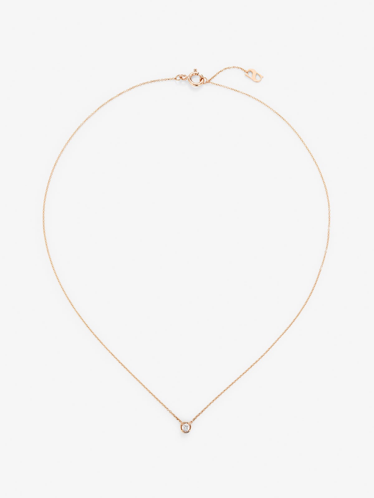 Colgante cadena de oro rosa de 18K con diamante solitario