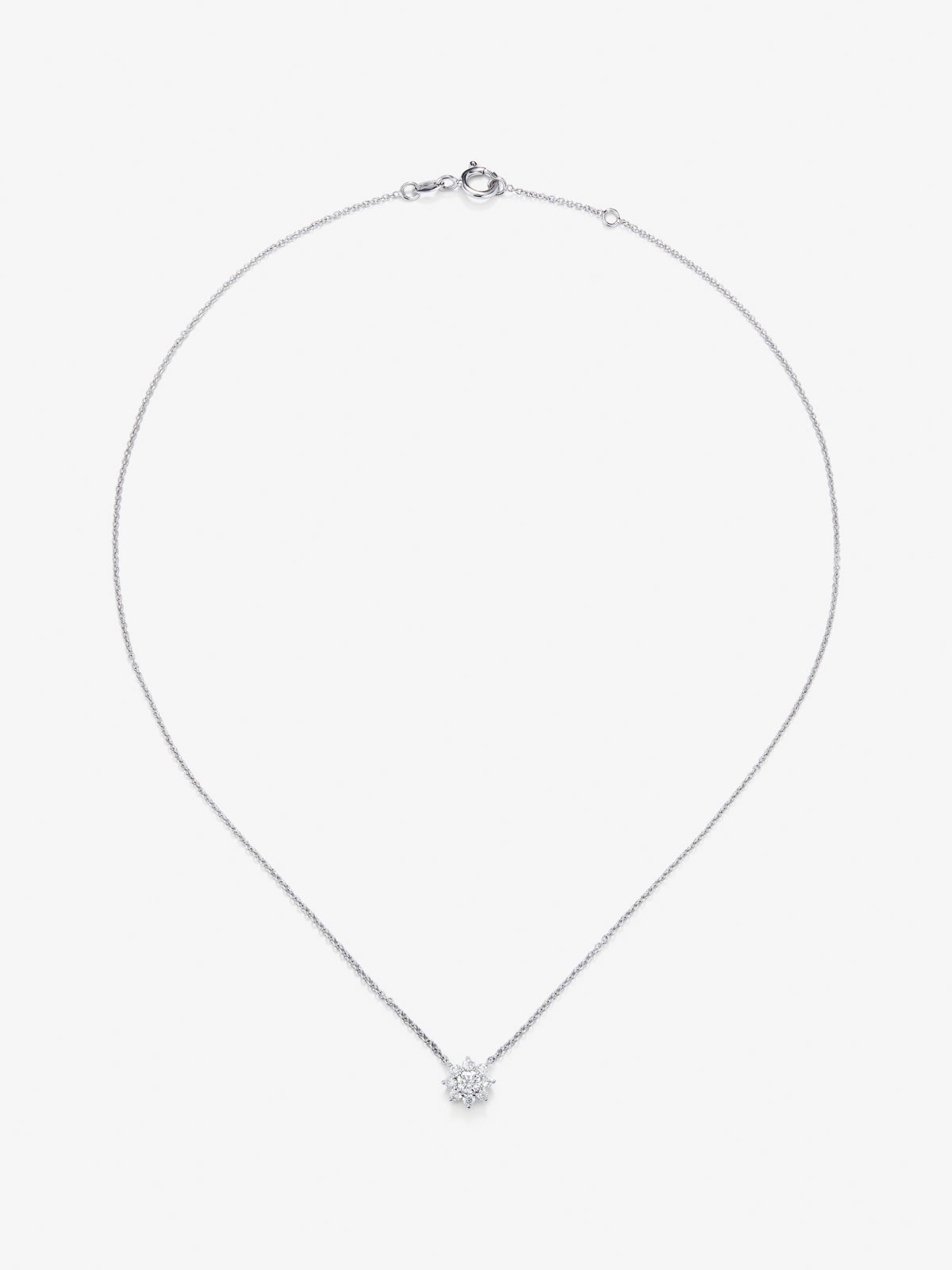 Colgante cadena flor de oro blanco de 18K con diamantes solitario y orla de diamantes