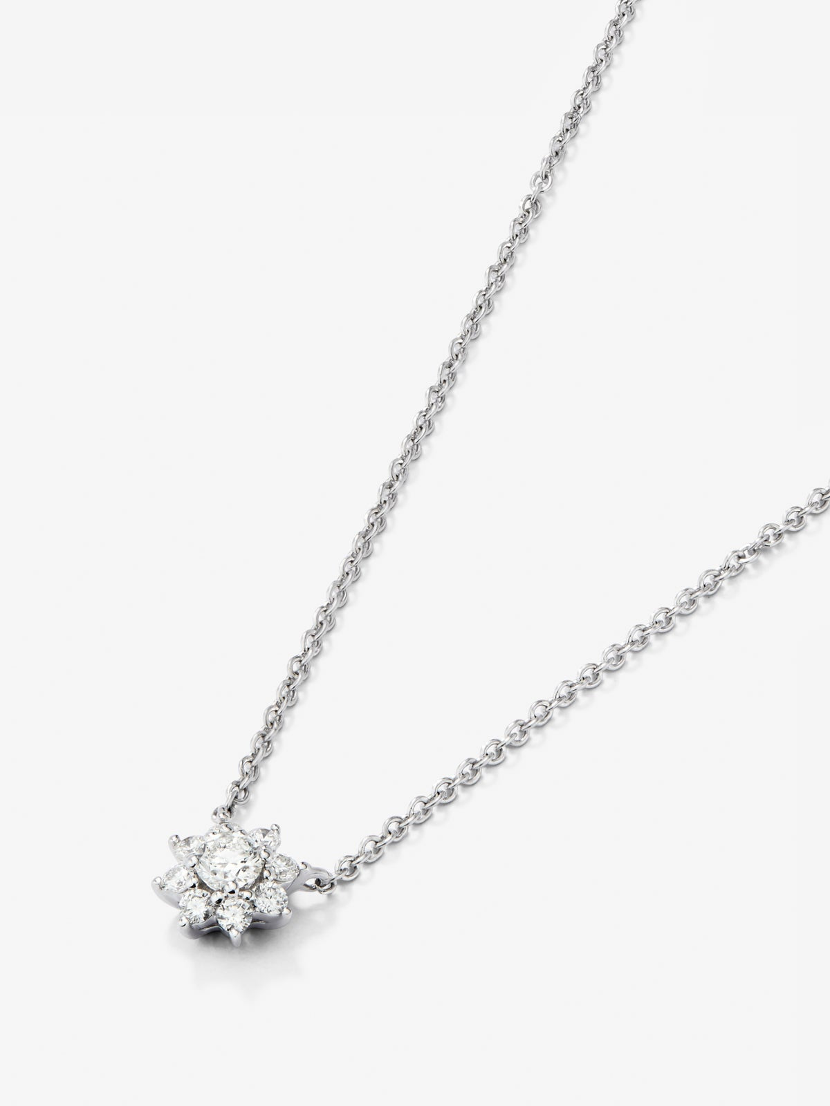 Colgante cadena flor de oro blanco de 18K con diamantes solitario y orla de diamantes