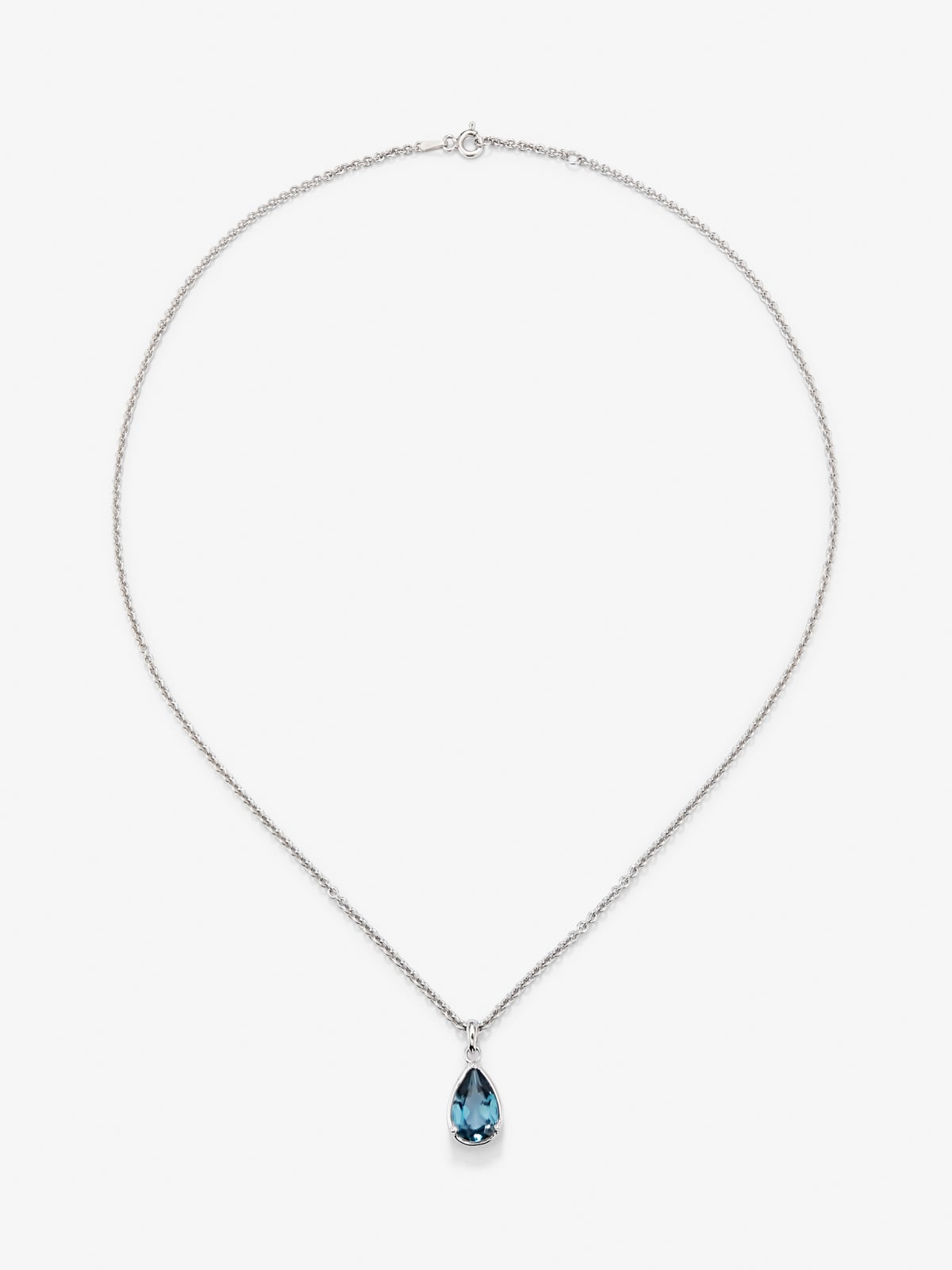 Colgante de plata con topacio azul