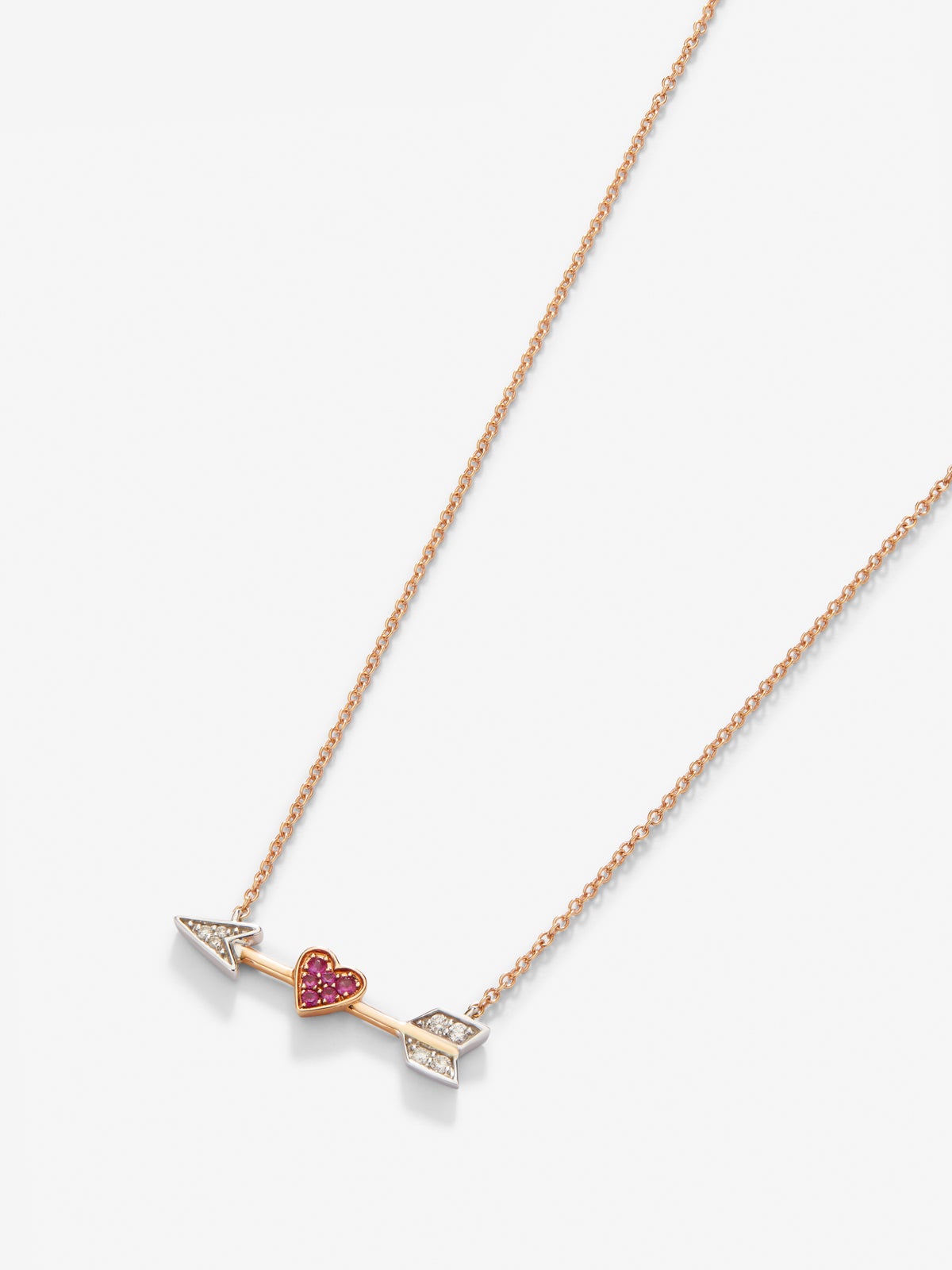 Colgante de oro rosa y oro blanco de 18kt con diamantes y zafiros