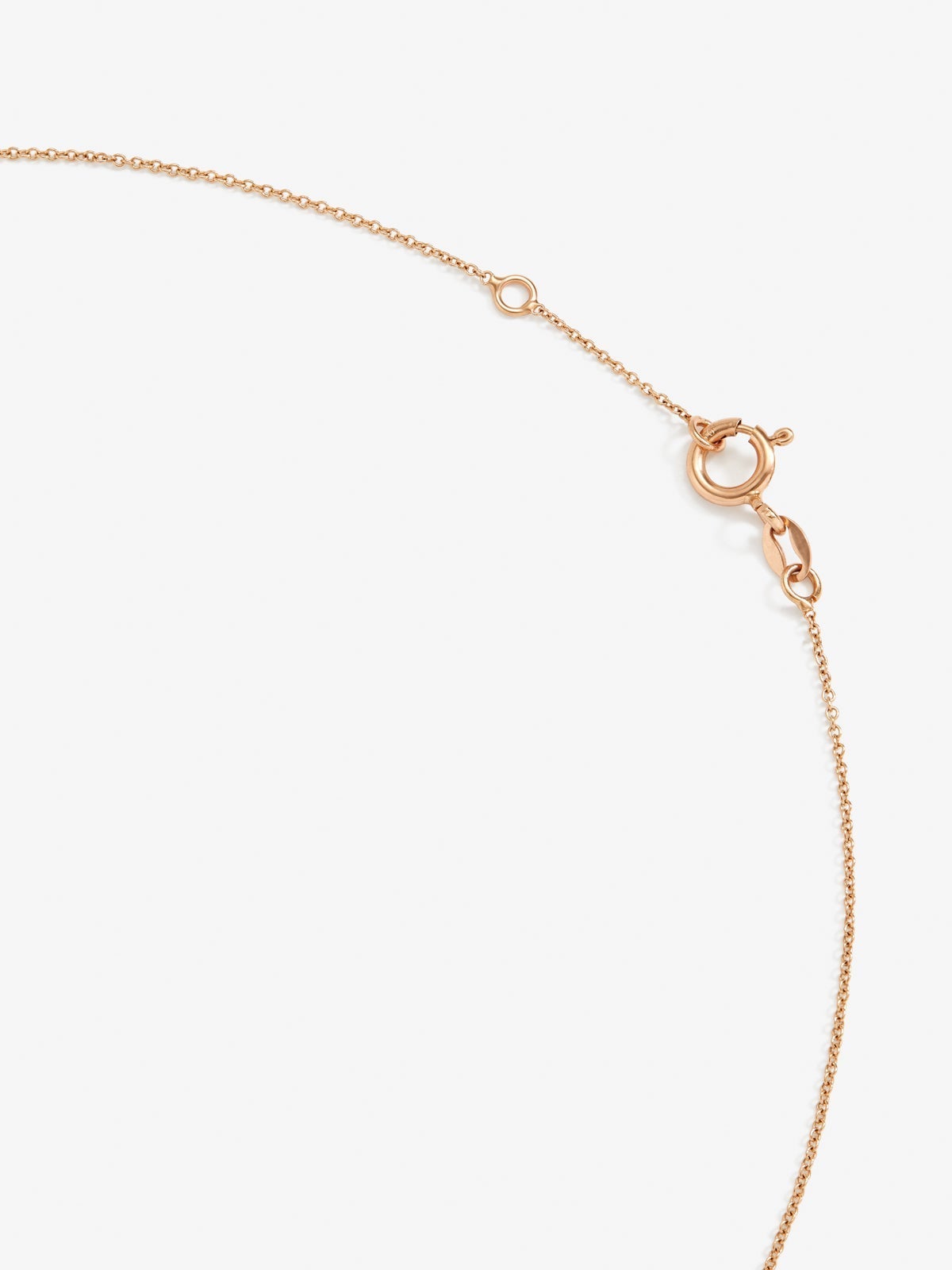 Colgante de oro rosa y oro blanco de 18kt con diamantes y zafiros