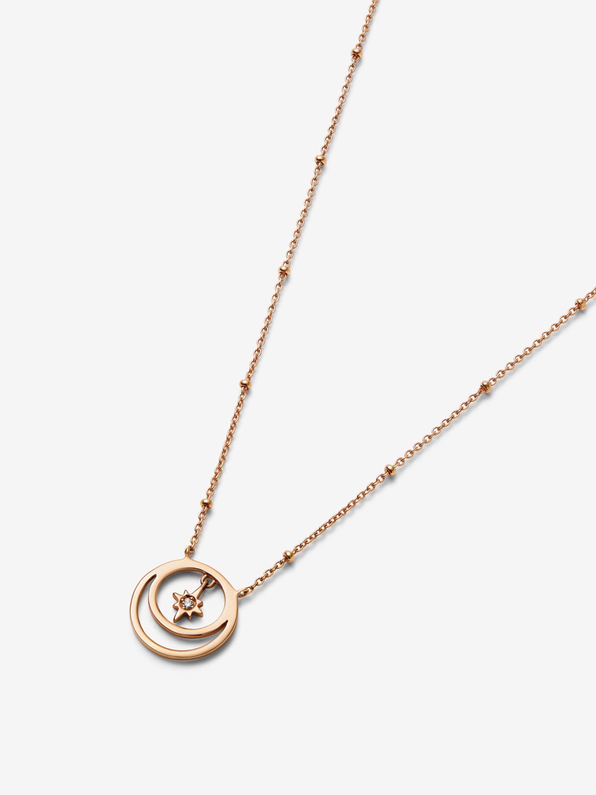 Colgante de oro rosa de 18K con diamante en talla brillante con un total de 0,01 cts