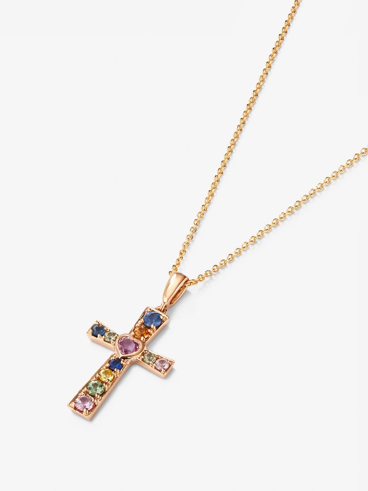 Colgante cadena cruz de oro rosa de 18K con zafiro