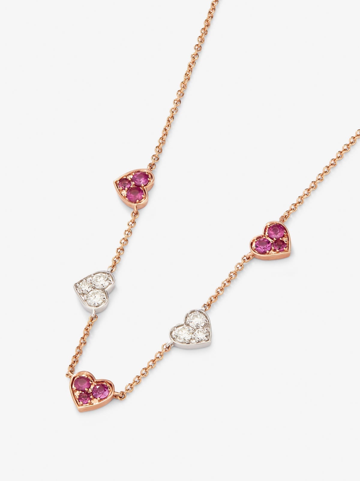 Collar corazones de oro rosa y oro blanco de 18kt con zafiros rosas y diamantes