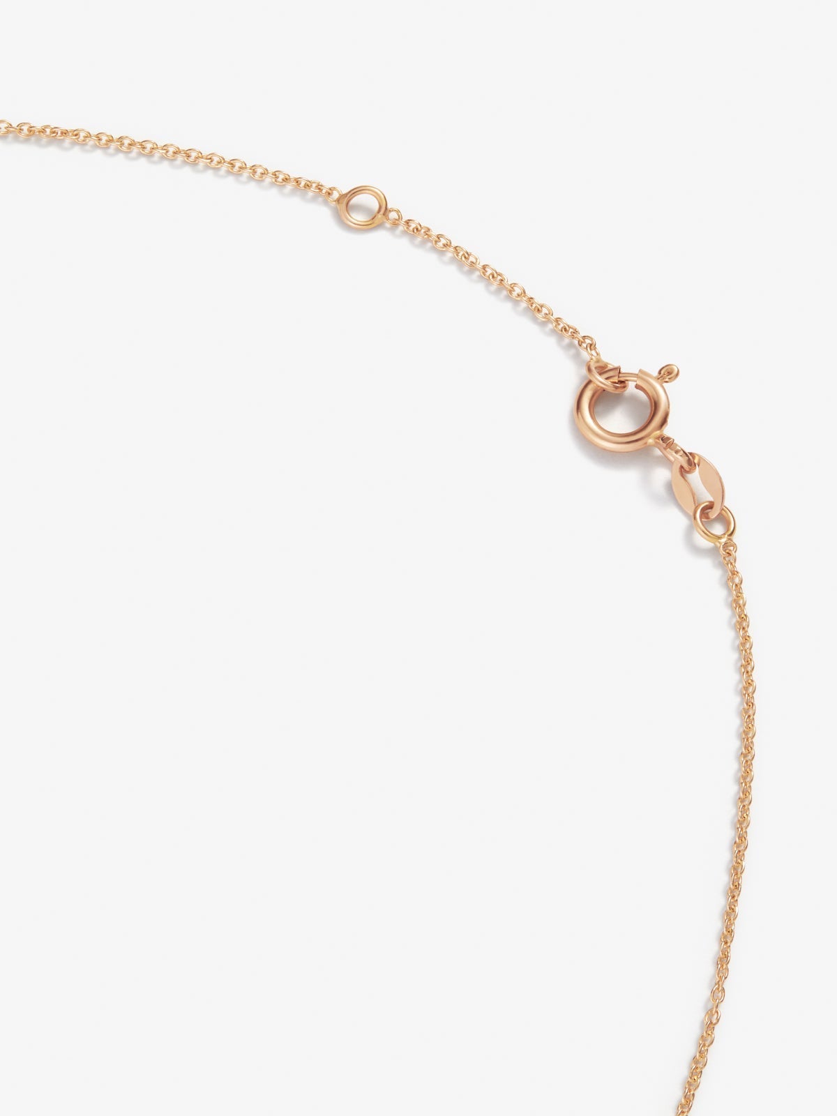 Colgante de oro blanco y oro rosa de 18kt con diamantes y zafiros