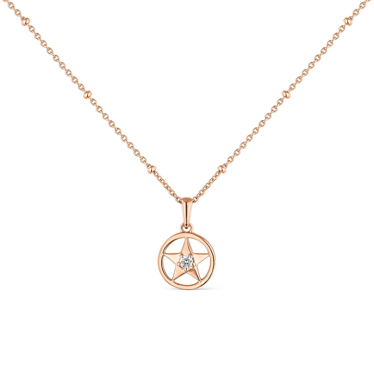 Colgante cadena estrella de oro rosa de 18K con diamante en talla brillante de 0,04 cts