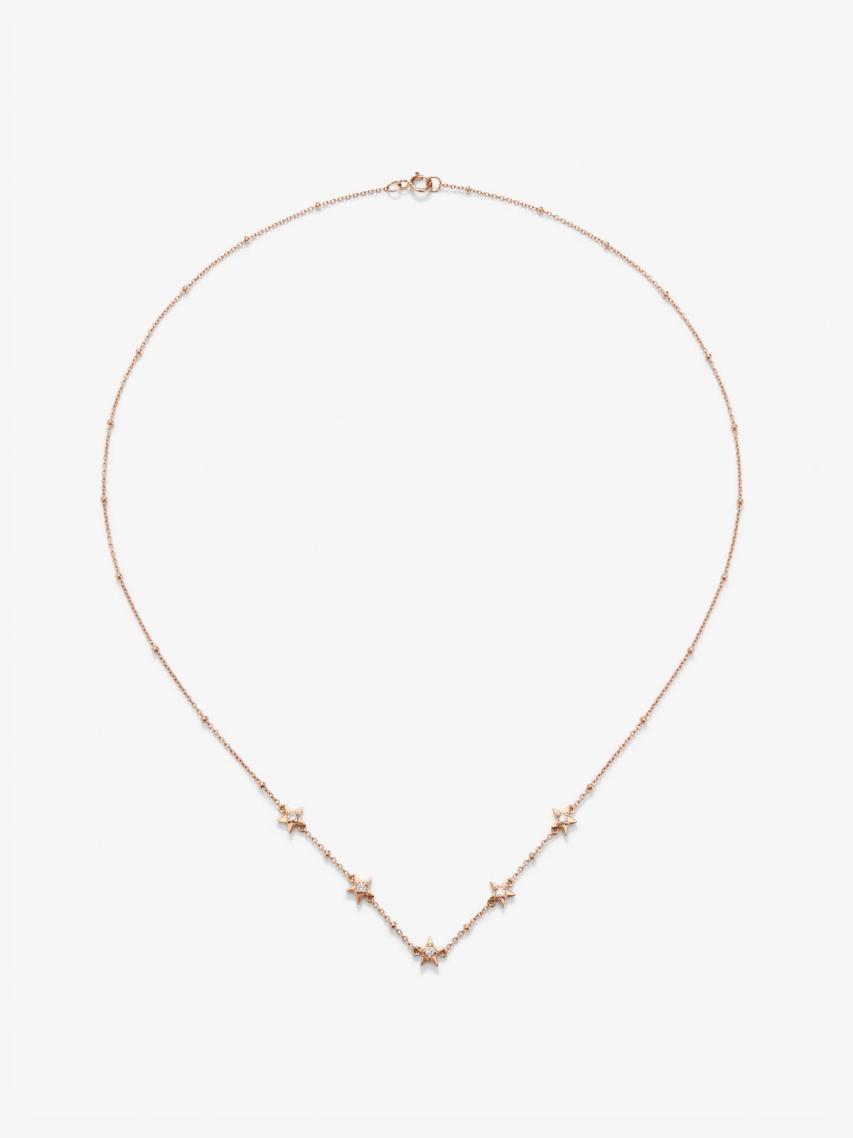 Colgante con estrellas de oro rosa de 18kt con diamantes