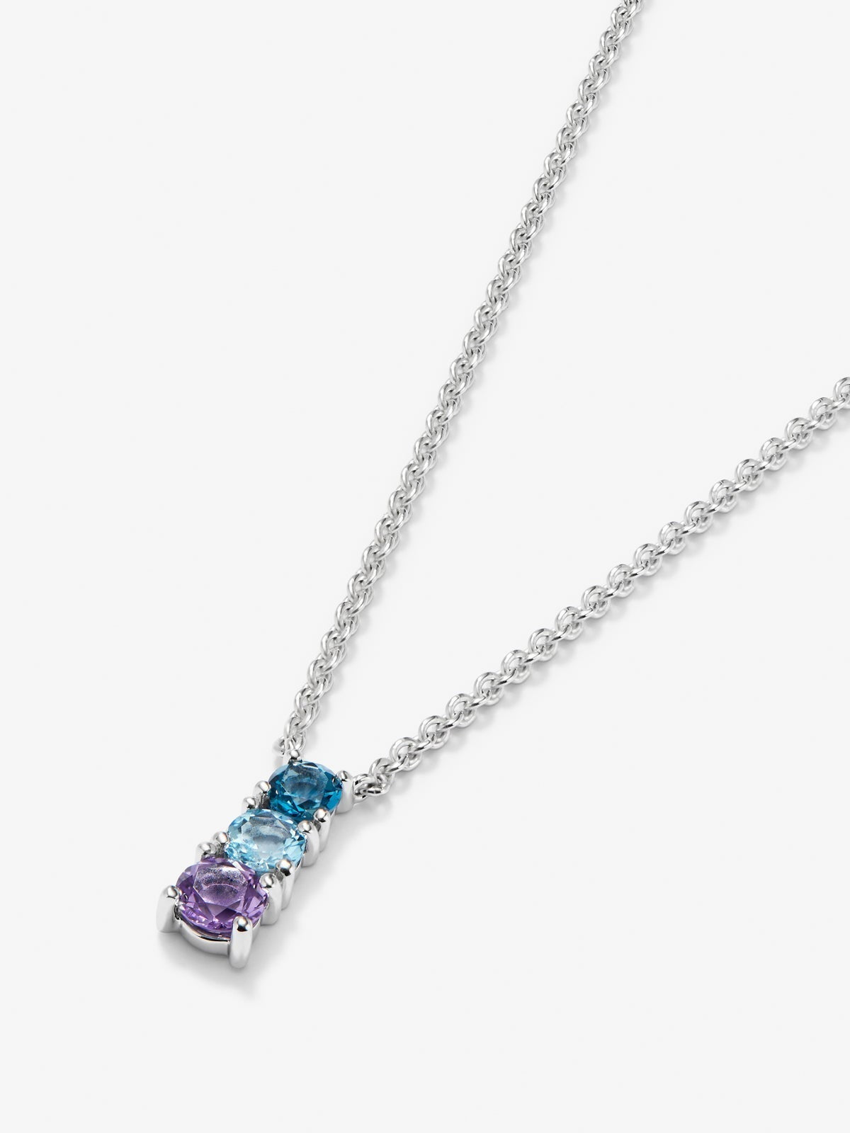 Colgante de plata 925 con topacio azul london, topacio azul swiss y amatista morada en talla brillante