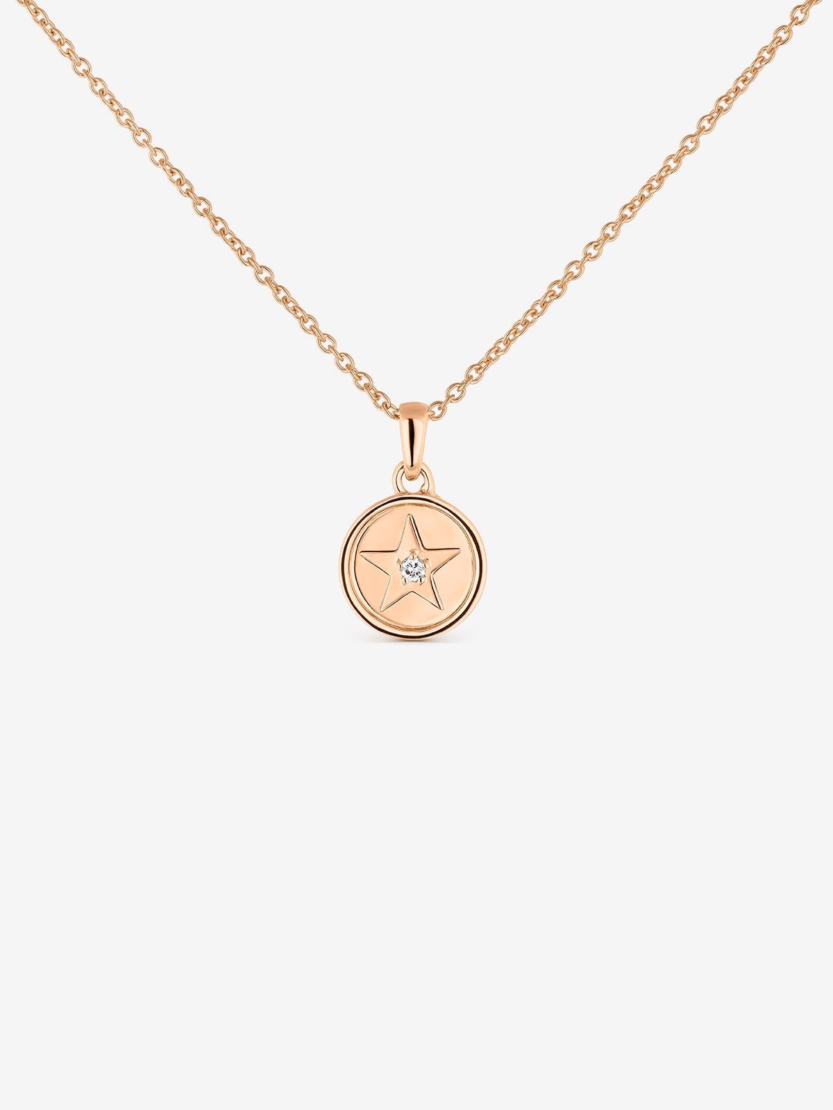 Colgante de oro rosa de 18K con forma de estrella y diamante de 0,01 cts
