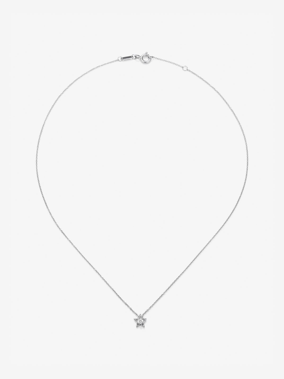 Colgante de oro blanco de 18K con diamante blanco en talla brillante de 0,1 cts y forma de estrella