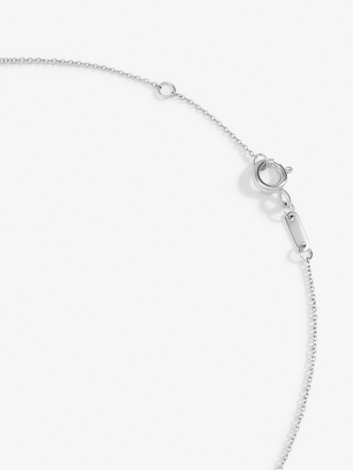 Colgante de oro blanco de 18K con diamante blanco en talla brillante de 0,1 cts y forma de estrella