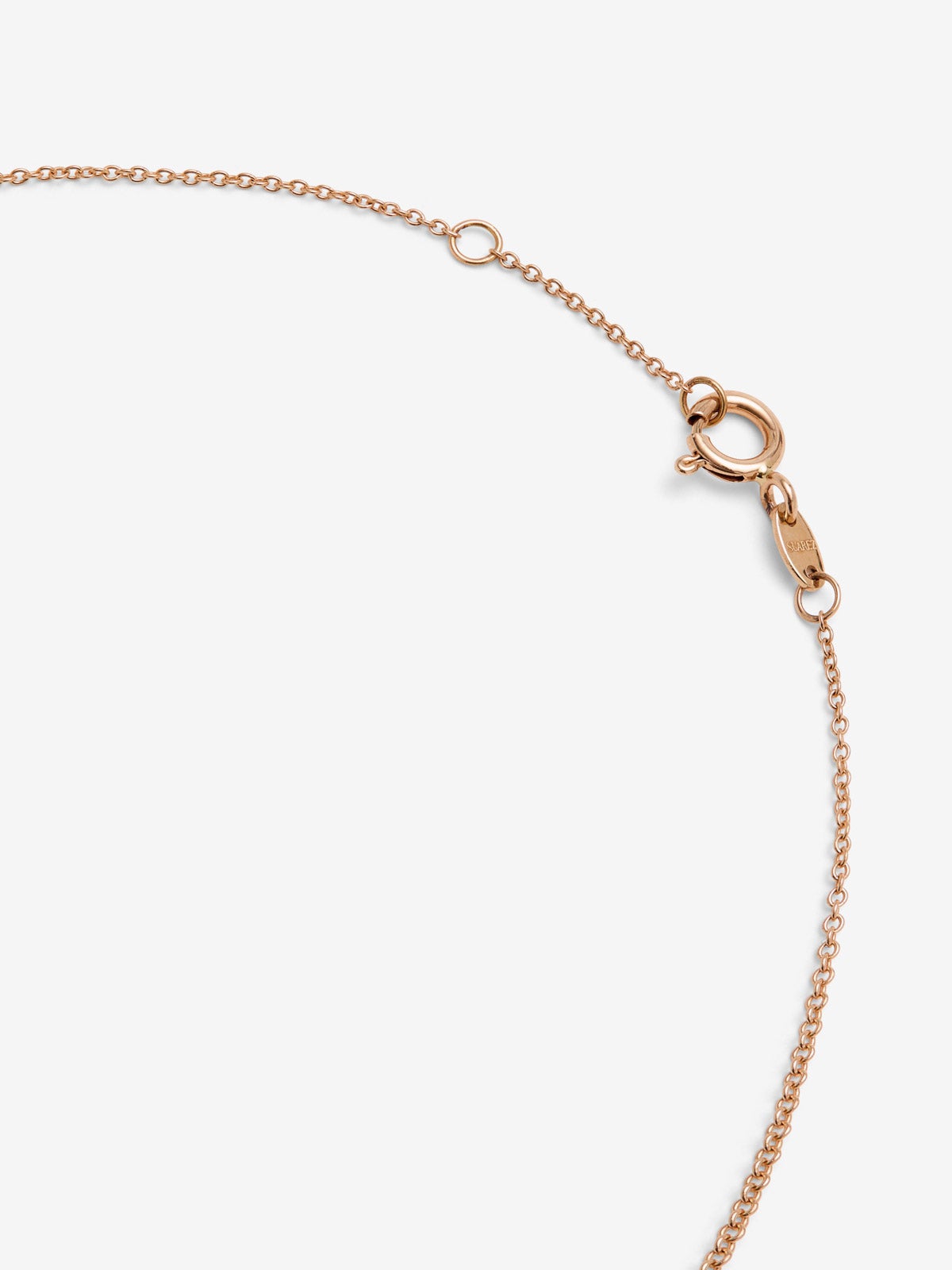 Colgante cruz de oro rosa de 18K con 30 zafiros rosas en talla brillante con un total de 1,88 cts y 6 zafiros azules en talla brillante con un total de 0,57 cts