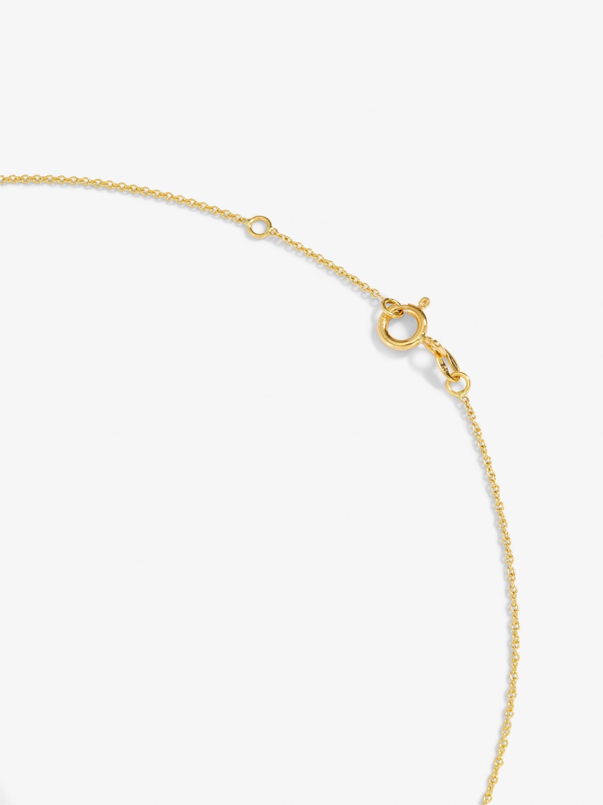 Colgante de oro amarillo de 18K con ónix negro de 1,45 cts y diamante blanco en talla esmeralda de 0,1 cts