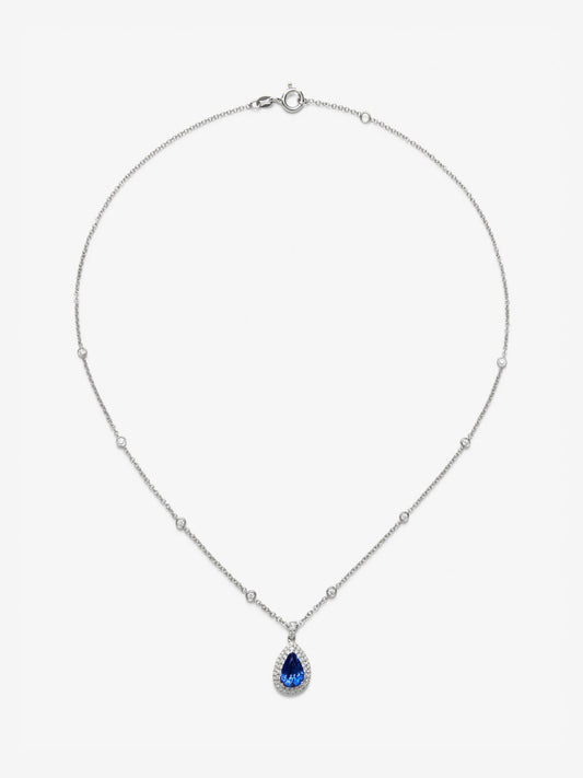 Colgante de oro blanco de 18K con un zafiro azul cornflower en talla pera 