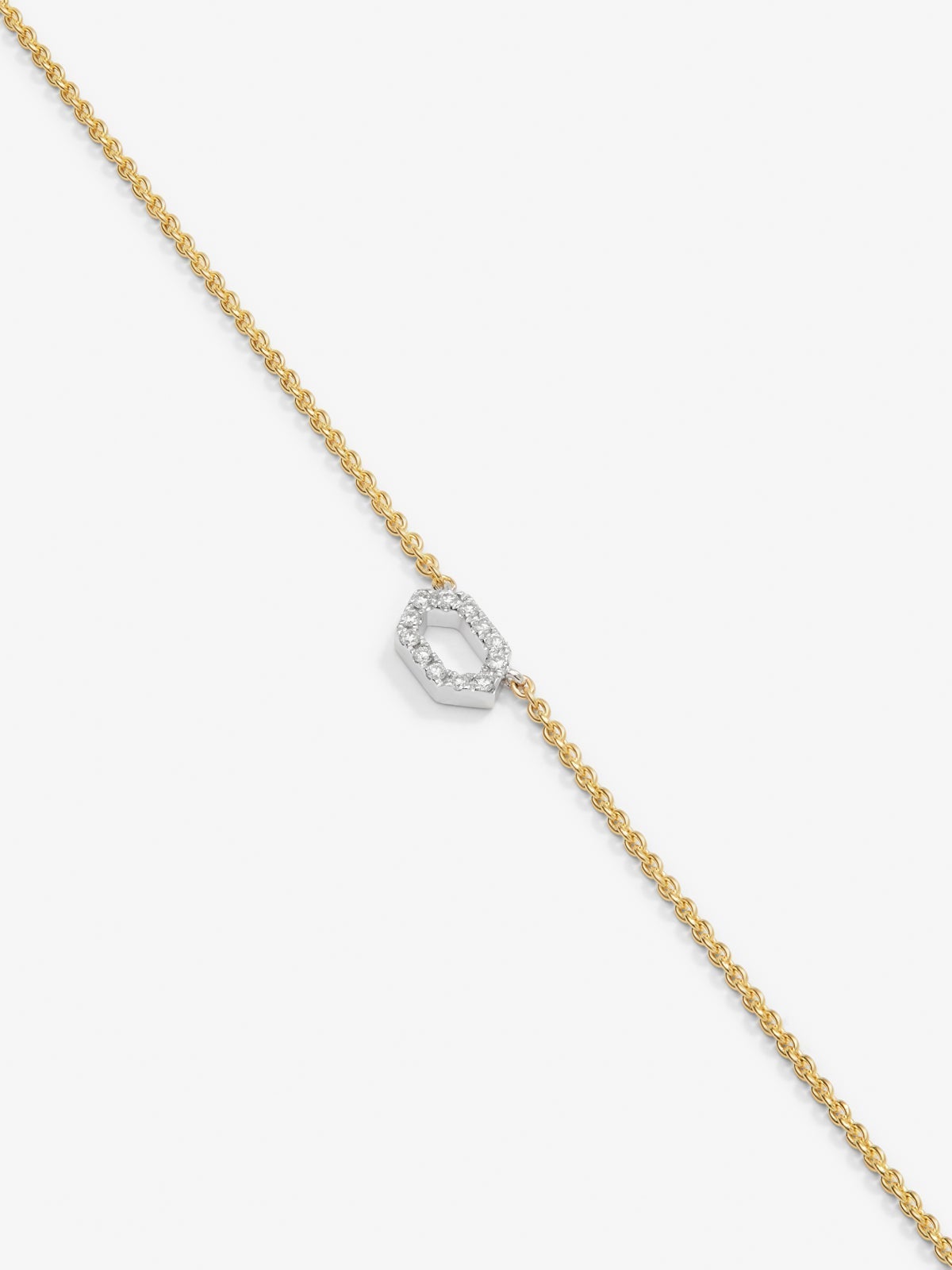 Colgante de oro blancoy amarillo de 18K con diamantes blancos en talla brillante de 0,06 cts