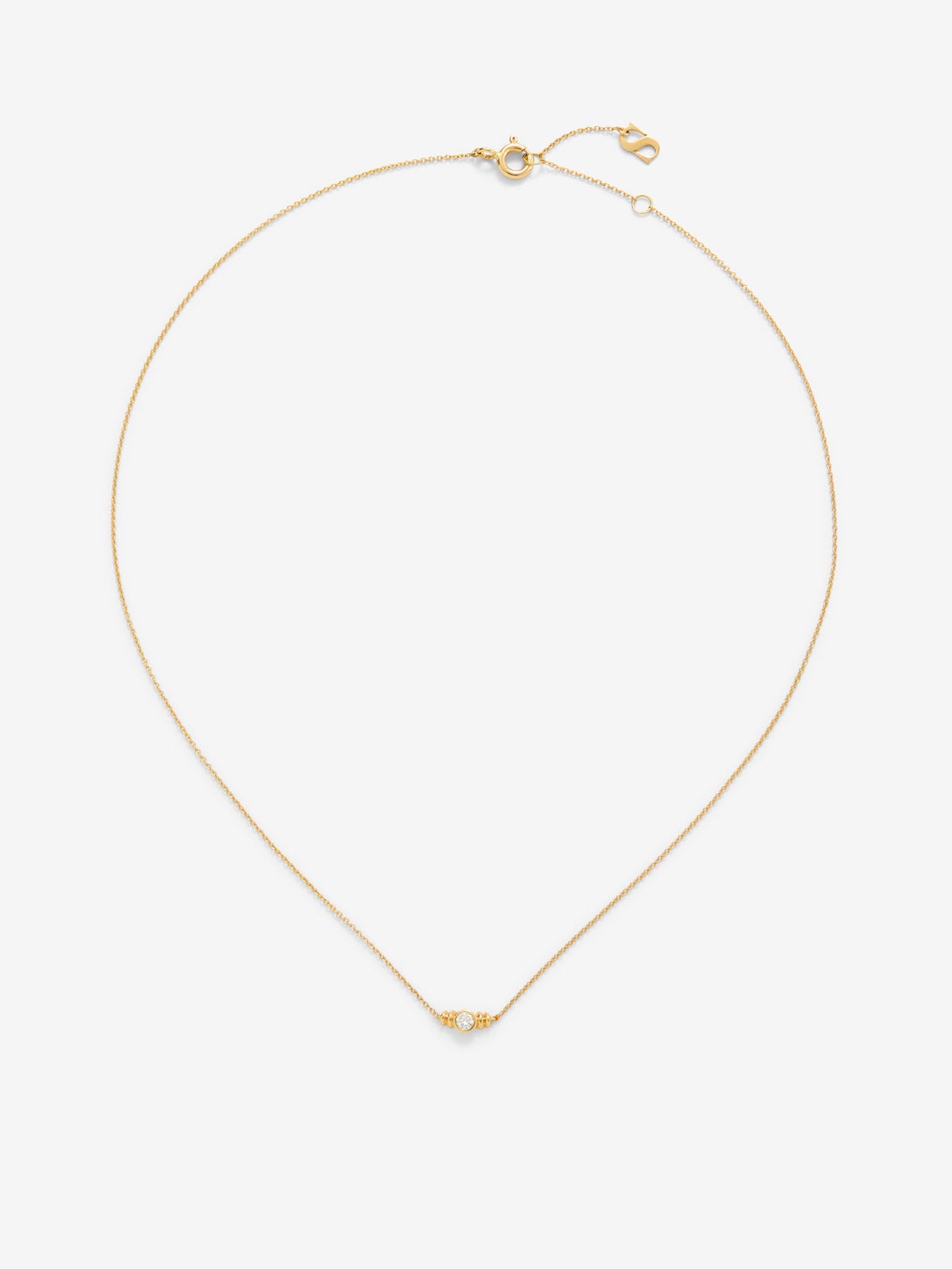 Colgante de oro amarillo de 18K con diamante en talla brillante de 0,07 cts