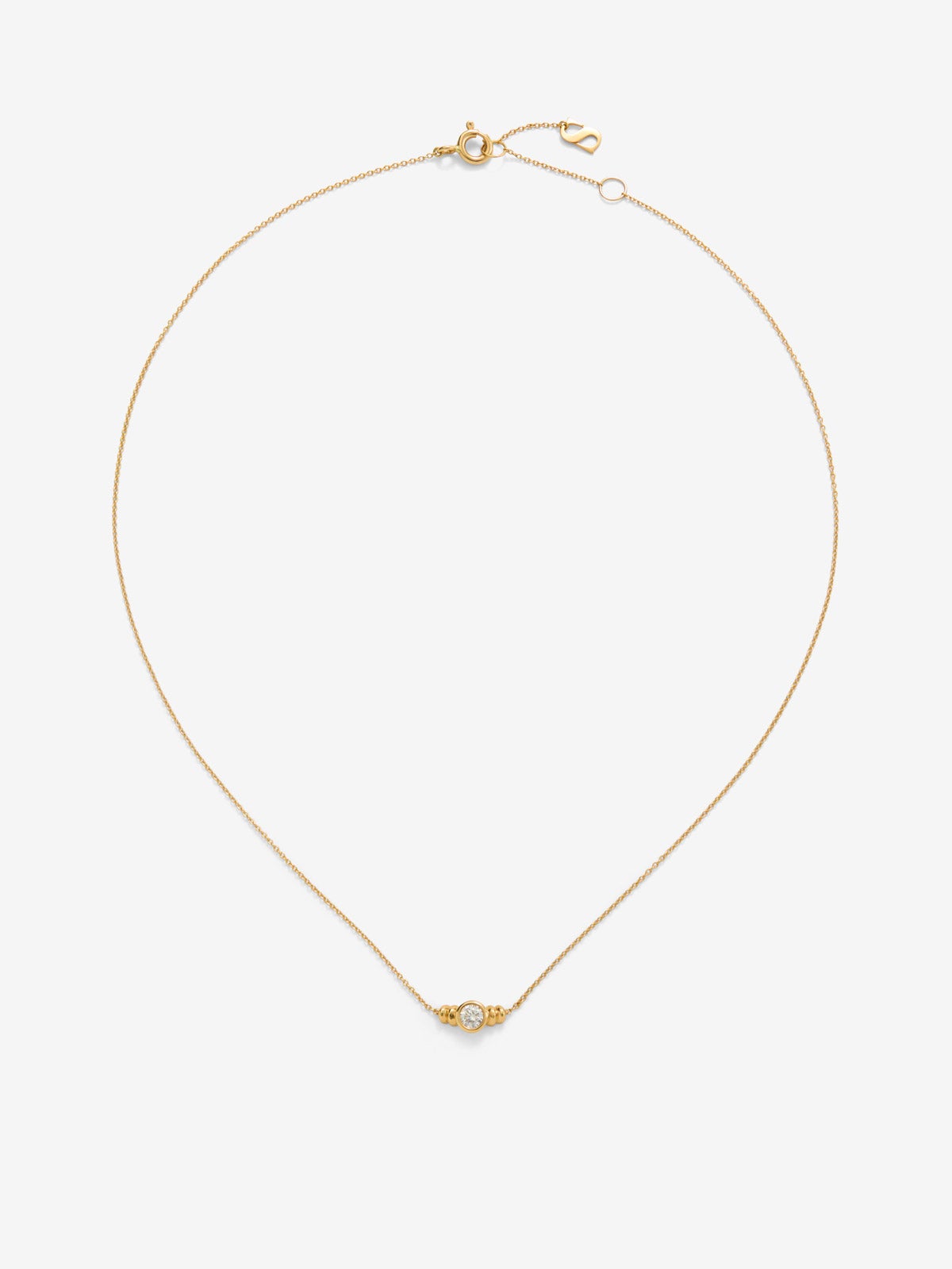 Colgante de oro amarillo de 18K con diamante en talla brillante de 0,17 cts