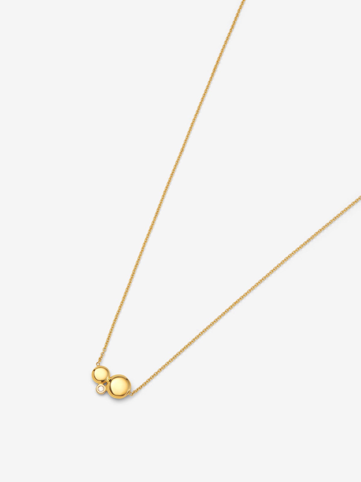 Colgante de oro amarillo de 18K con diamante de 0,03 cts y motivos de esferas