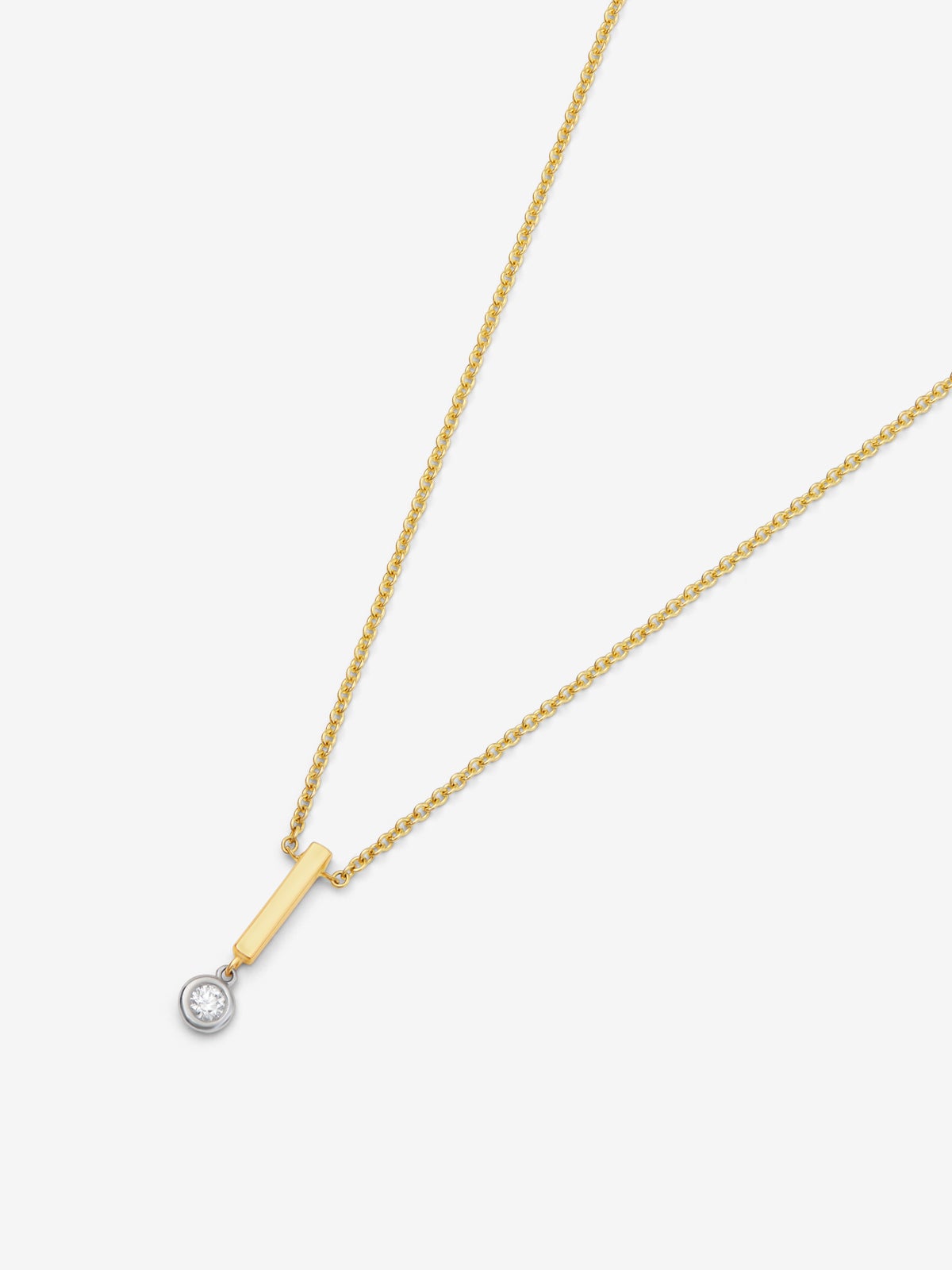 Colgante de oro amarillo de 18K con diamante en talla brillante de 0,06 cts