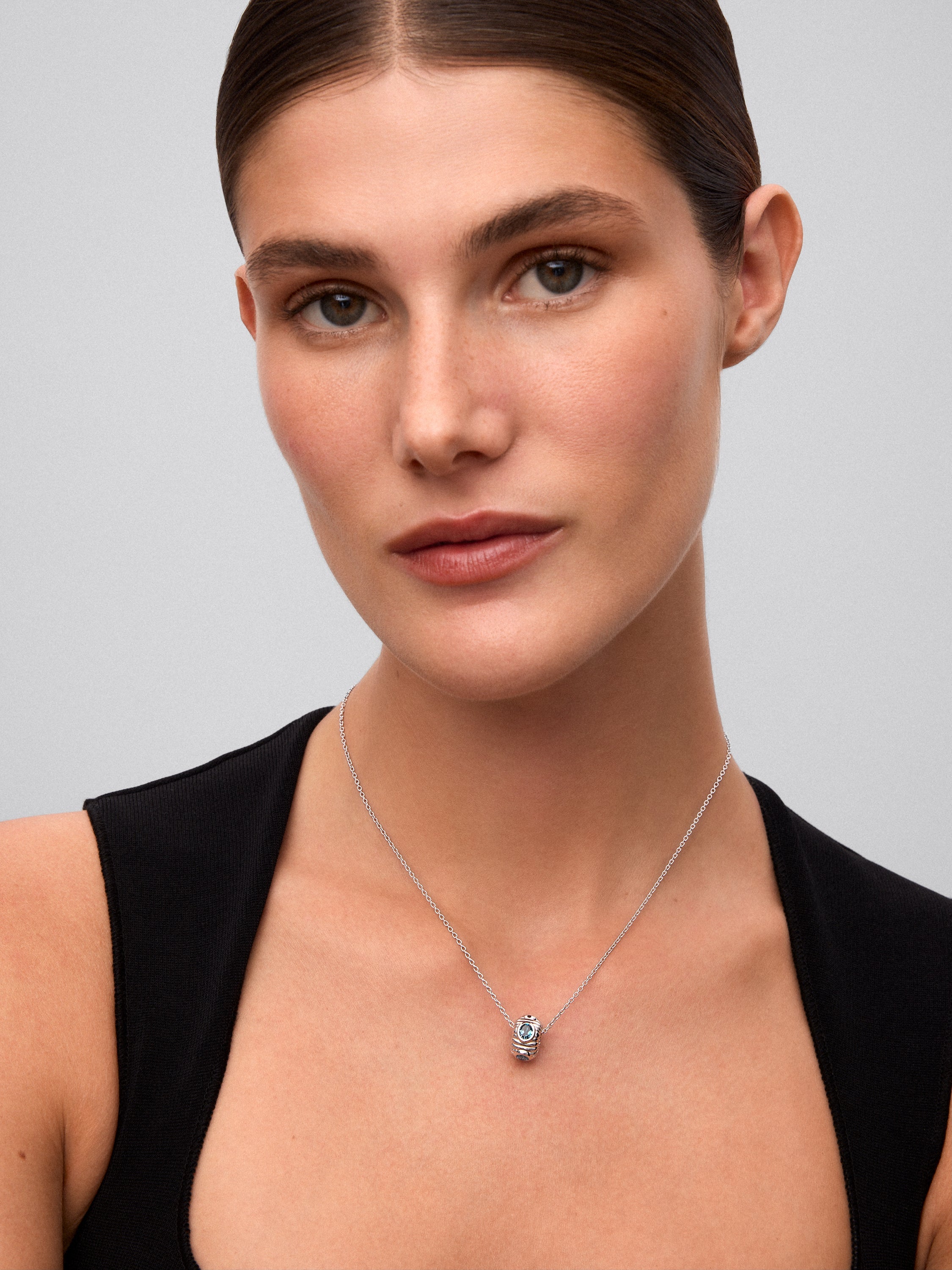 Colgante de plata 925 con topacio azul London y azul swiss