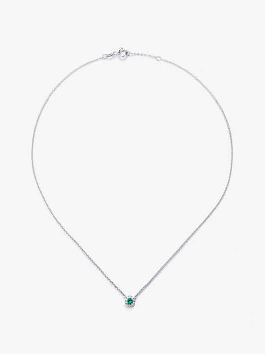 Colgante de oro blanco de 18K con esmeralda en talla brillante de 0,255 cts y diamantes en talla brillante de 0,086 cts