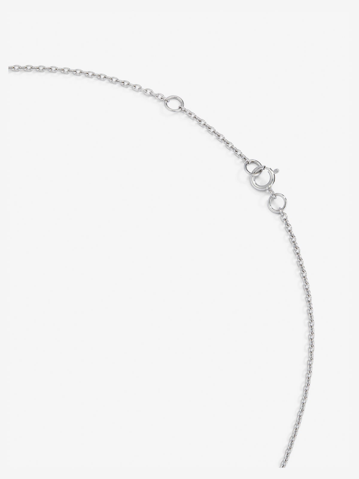 Colgante de oro blanco de 18K con esmeralda en talla brillante de 0,33 cts y diamantes en talla brillante de 0,09 cts