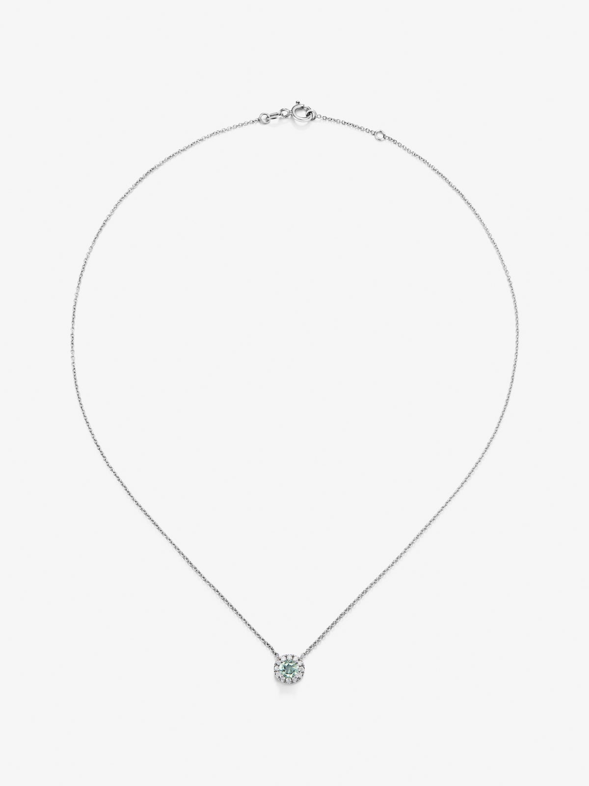 Colgante de oro blanco de 18K con una amatista verde en talla brillante de 0,44 cts y 12 diamantes en talla brillante con un total de 0,13 cts