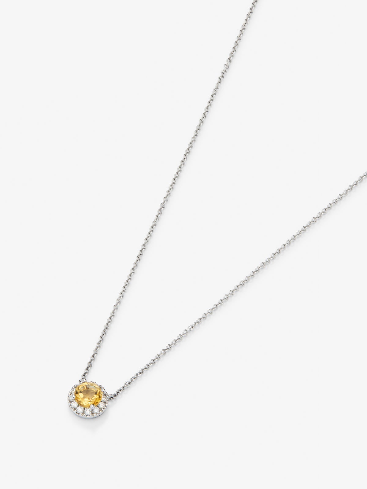 Colgante de oro blanco de 18K con cuarzo citrino 0,57 cts y diamantes 0,14 cts