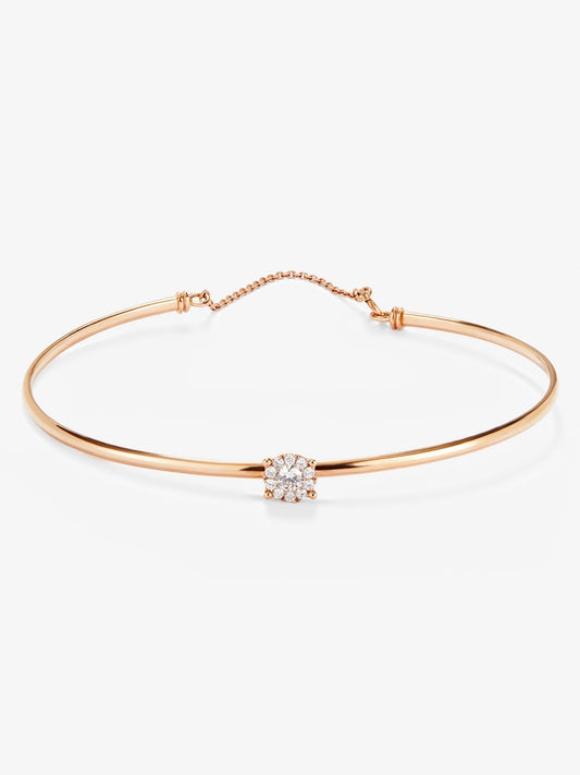 Pulsera rígida de oro rosa de 18K con 11 diamantes en talla brillante con un total de 0,21 cts