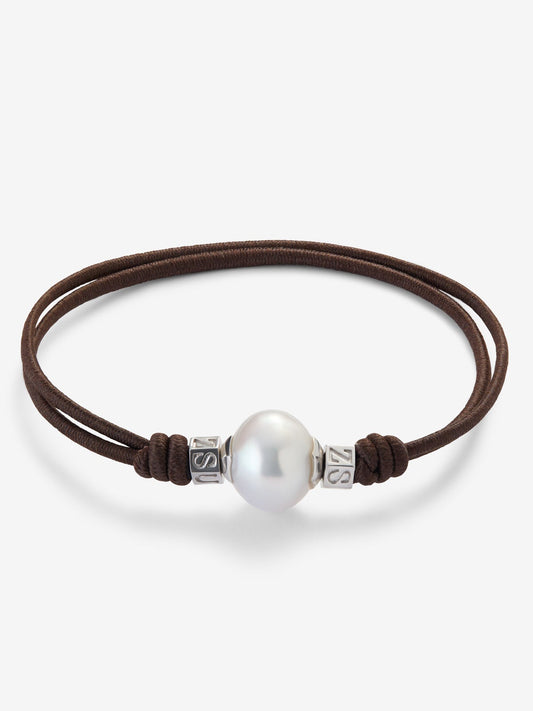 Pulsera one con perla australiana y detalles de plata 925
