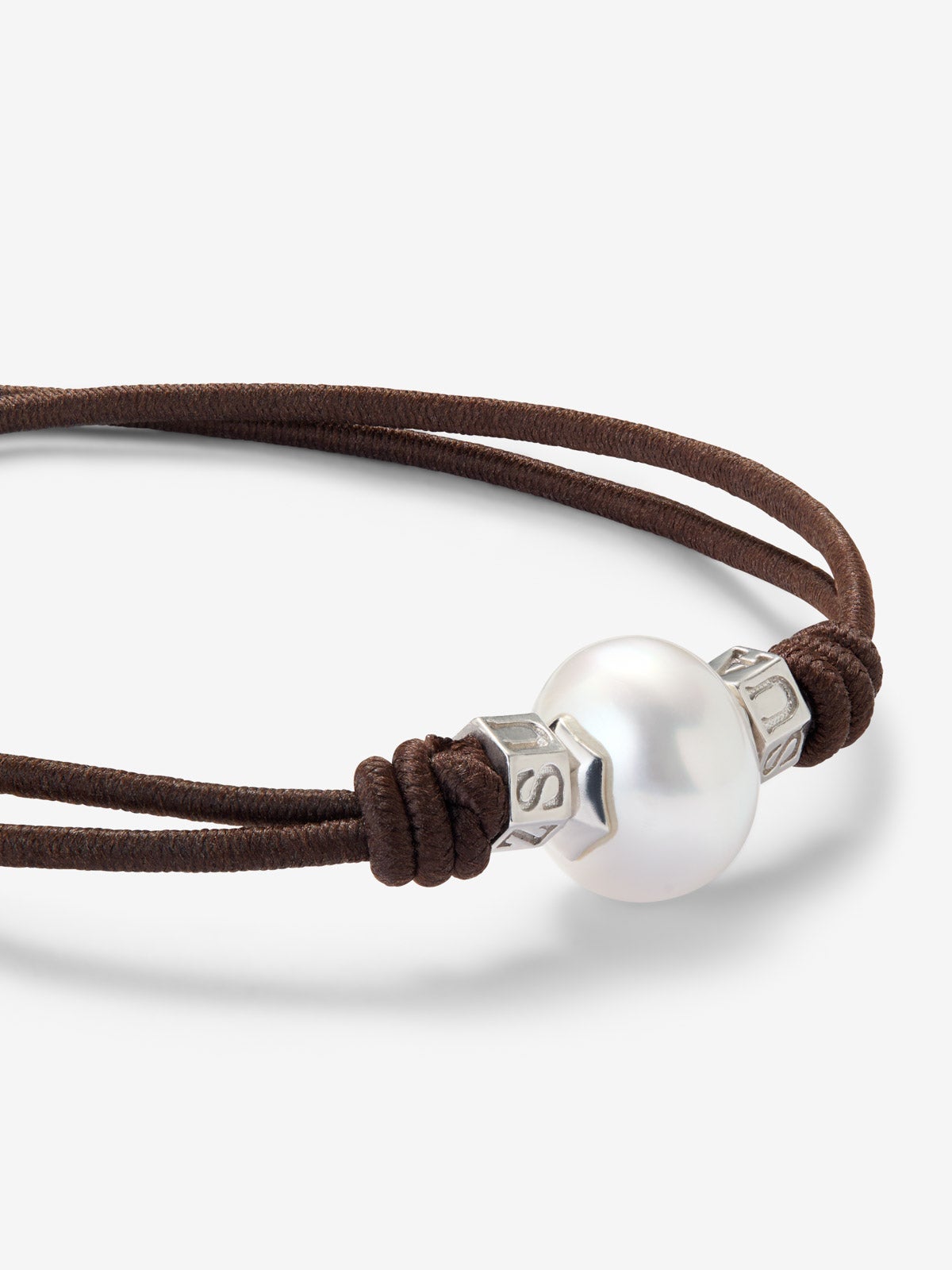 Pulsera one con perla australiana y detalles de plata 925