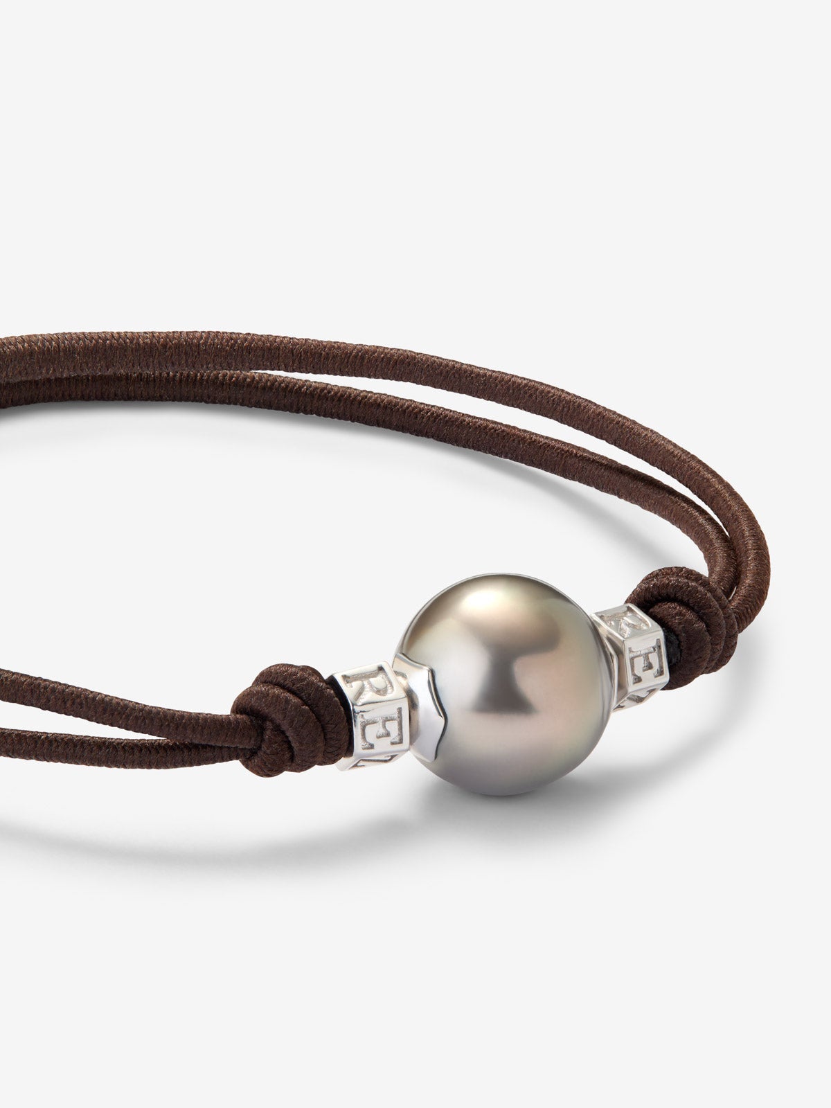 Pulsera one con perla tahití y detalles de plata 925