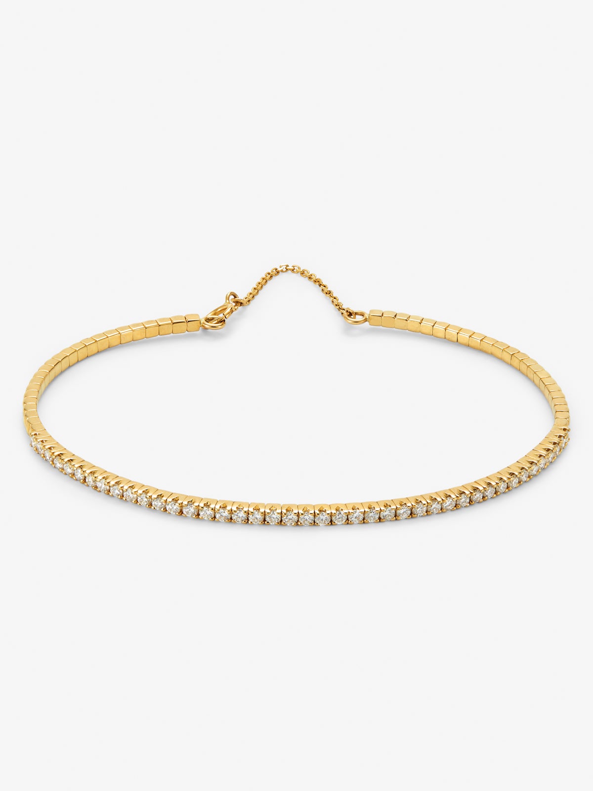 Pulsera rivière de oro amarillo de 18K con diamantes en talla brillante con un total de 0,373 cts