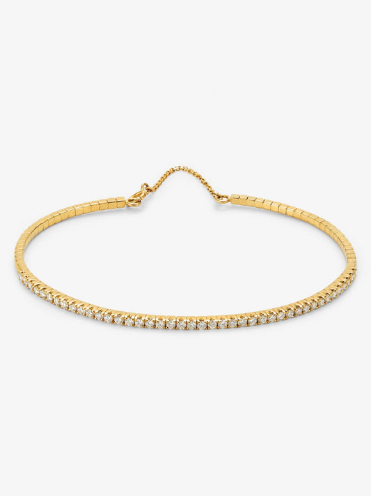 Pulsera rivière de oro amarillo de 18K con diamantes en talla brillante con un total de 0,373 cts
