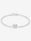 Pulsera cadena con inicial de oro blanco de 18K y diamantes