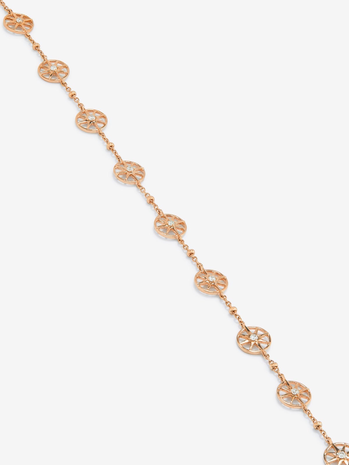 Pulsera cadena con estrellas de oro rosa de 18K con diamantes